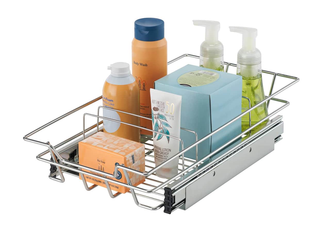The image shows a metal shelf with various items on it, including a box of tissues, a bottle of lotion, and a bottle of soap. The tissues are located on the left side of the shelf, while the bottle of lotion is in the middle, and the bottle of soap is on the right side. The shelf is filled with these items, creating an organized and functional storage space.