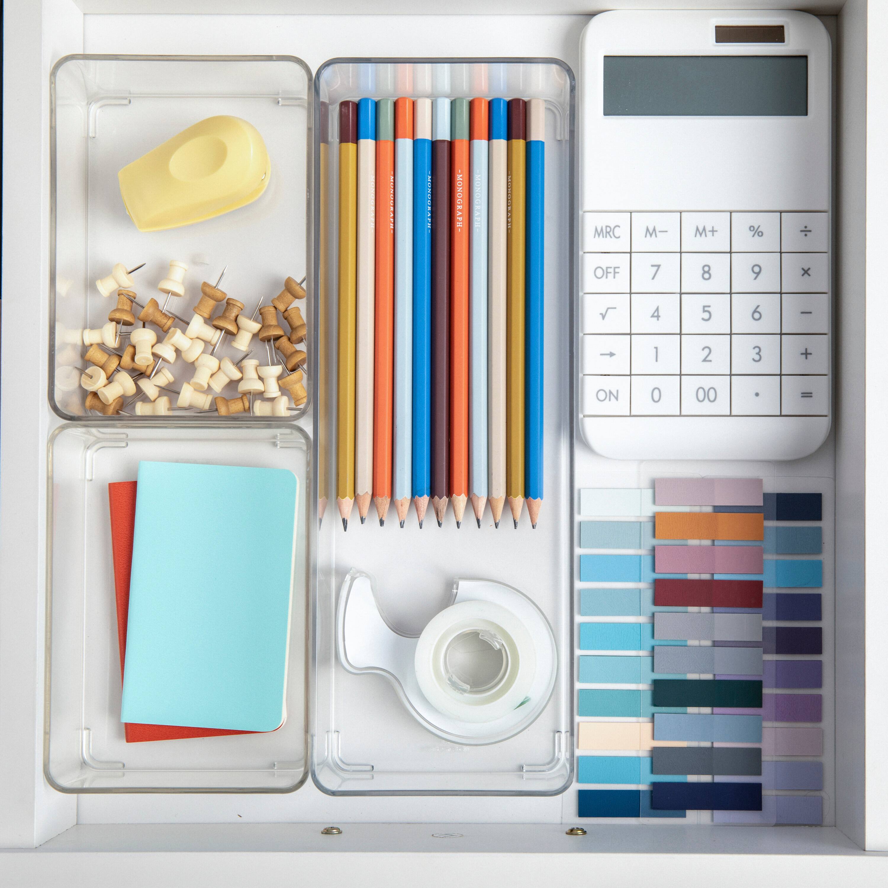 The text on the image reads: "Mondceat Artairiti MRC OFF M- 7 M+ 8% 9 x 4 5 6 - 1 2 3 + ON 0 00 . -". This text is a mix of numbers, letters, and symbols, but it does not form coherent sentences or phrases. It is likely that this text is a random combination of characters or a code, rather than a meaningful message.