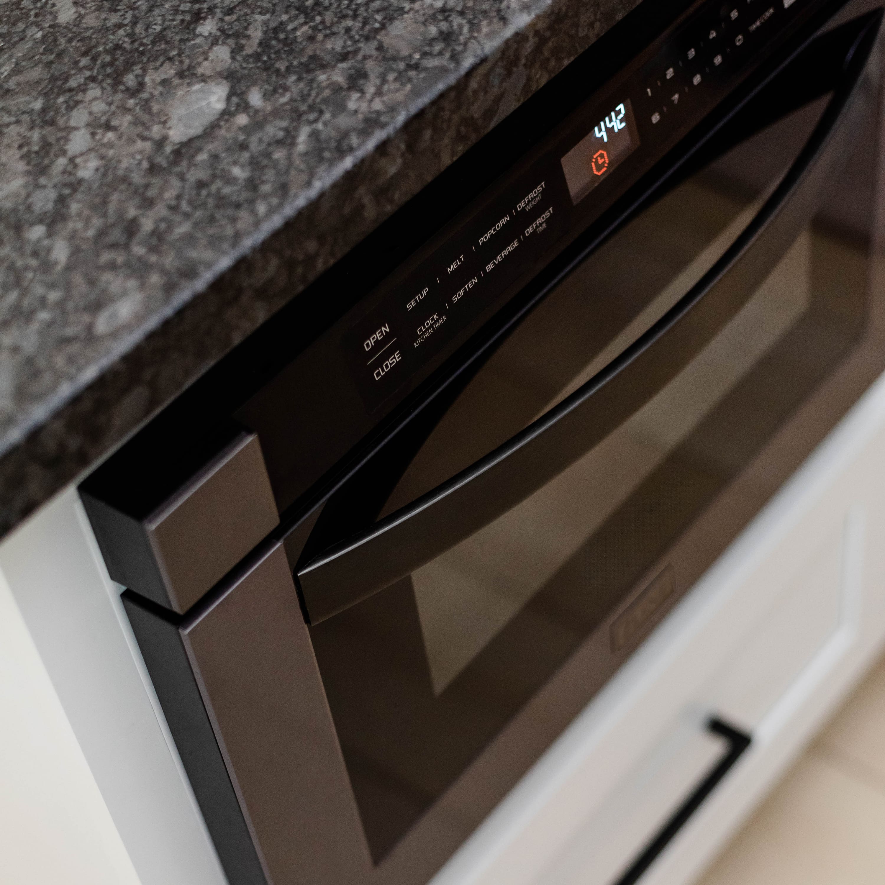 The text on the image reads: "Defrost RF-1205 - PPCorn Dryerost - Melting Deverage - In Setup Soften Soft - Clock Keen Open Then Close - 442".