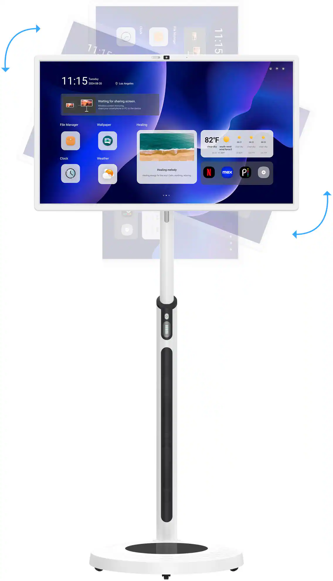 The image features a computer monitor on a stand, with the time displayed as 11:15. The monitor is turned on, and the screen is showing the time and date. The stand is white, and the monitor is placed on top of it. The image also shows a clock in the background, indicating the time of 11:15.