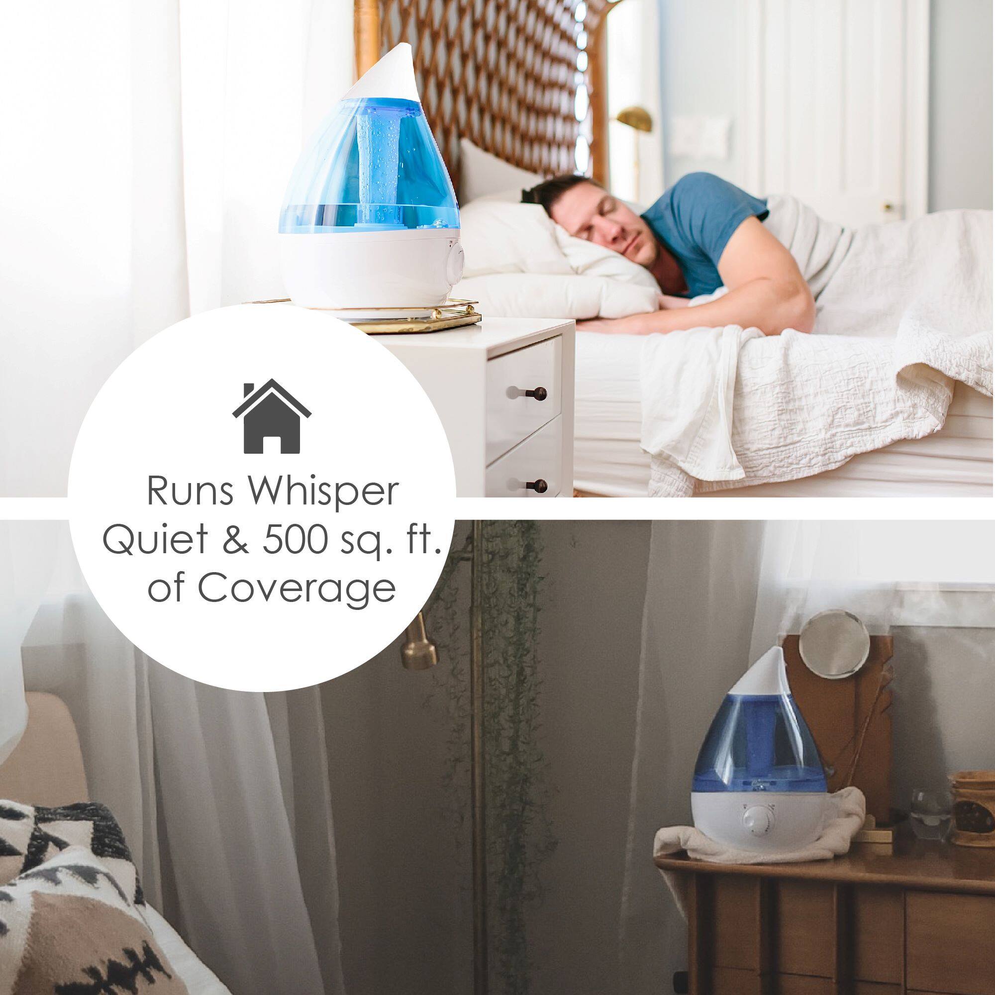 The image shows a man lying on a bed with a blue shirt, and a white pillow. There is a humidifier on the bed, which is designed to run quietly and provide coverage of up to 500 square feet. The humidifier is placed next to a nightstand, which has a lamp on it. The scene appears to be a cozy and comfortable bedroom setting.