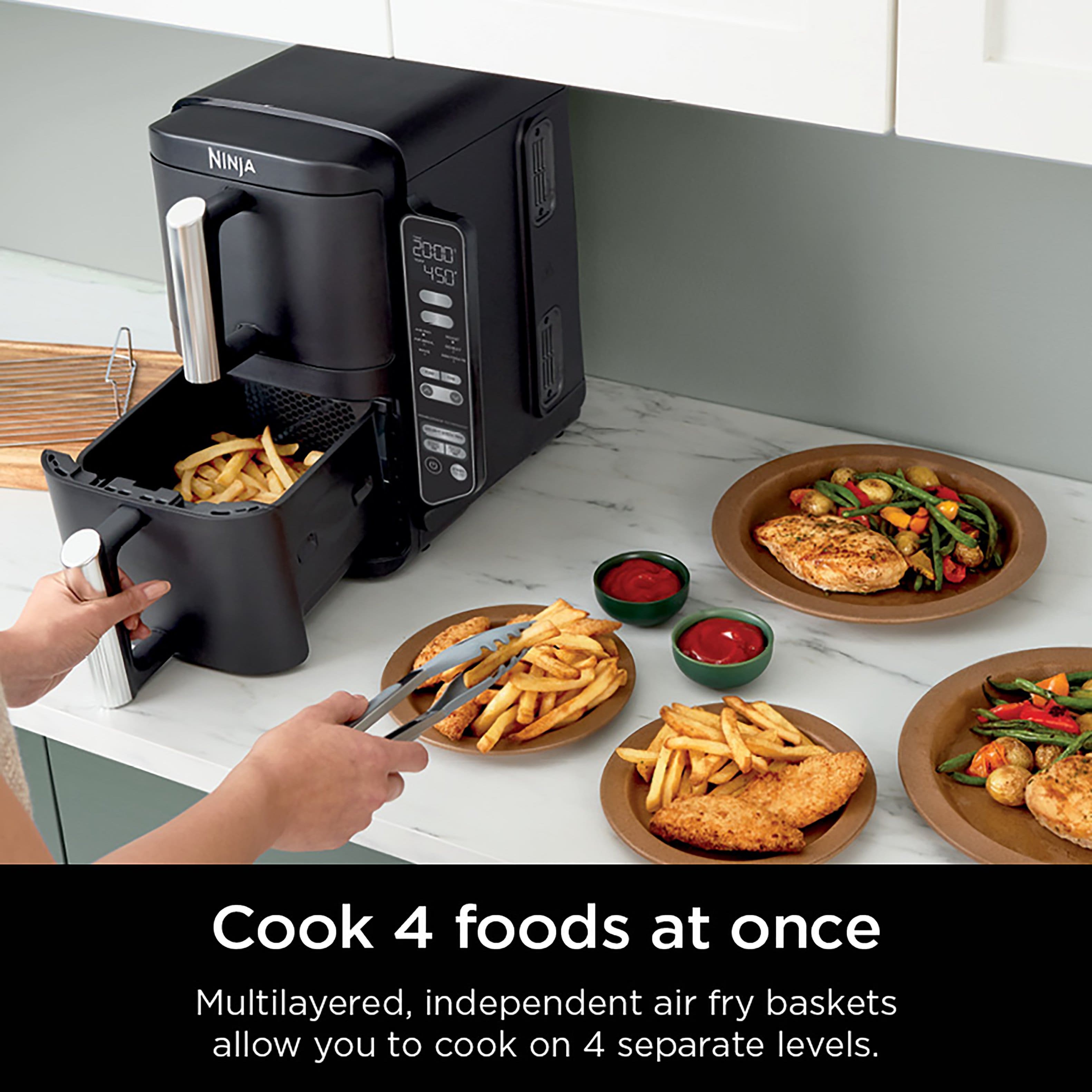 "Cook 4 foods at once with the Ninja 2000 450. Multilayered, independent air fry baskets allow you to cook on 4 separate levels."