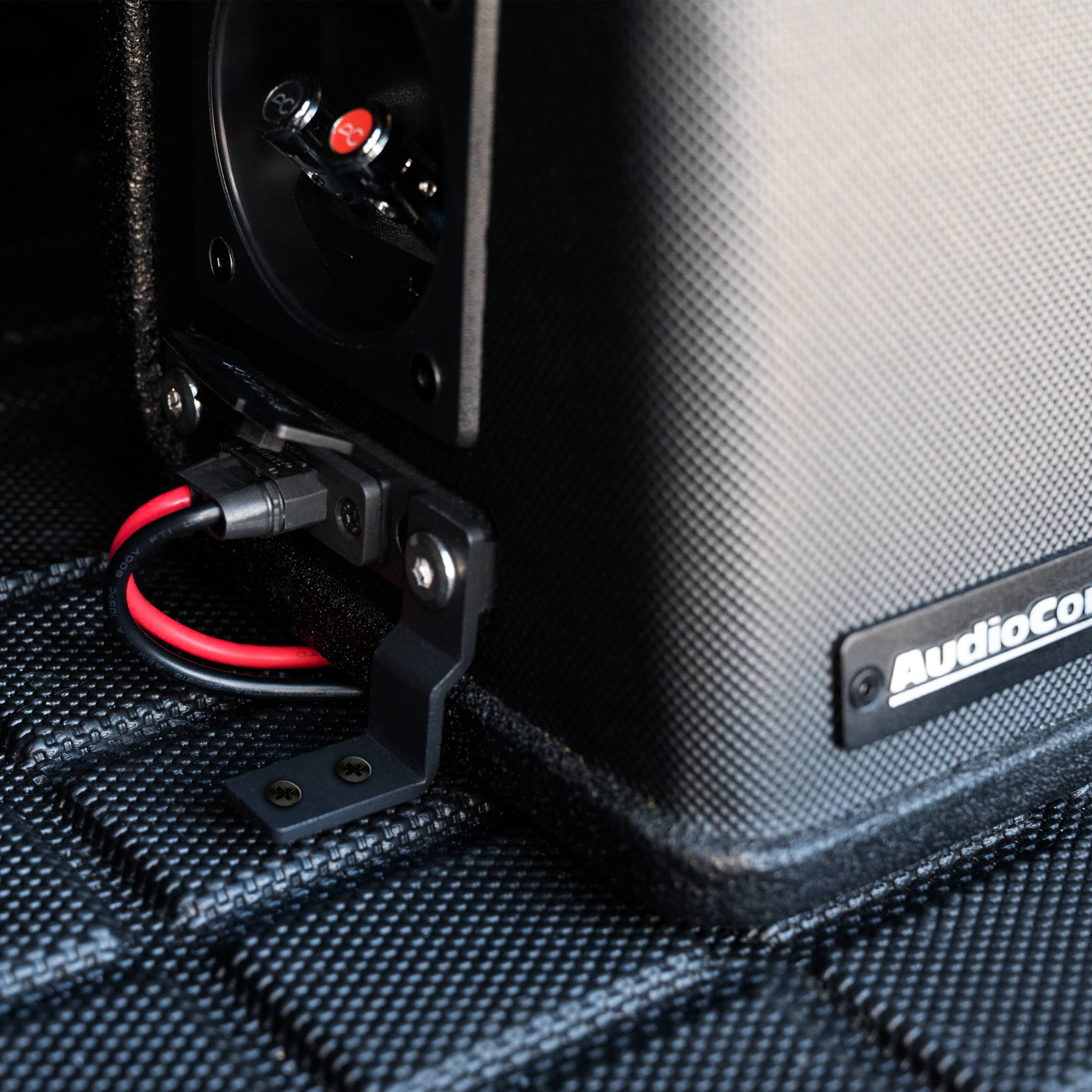 The text on the image reads "AudioCo."