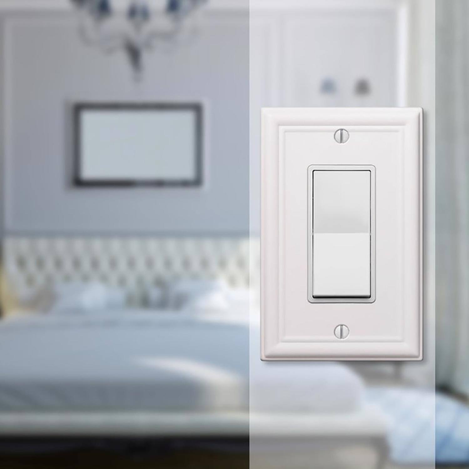 Left. AMERELLE - Amerelle Chelsea White 1 gang Stamped Steel Decorator Wall Plate 1 pk - White.