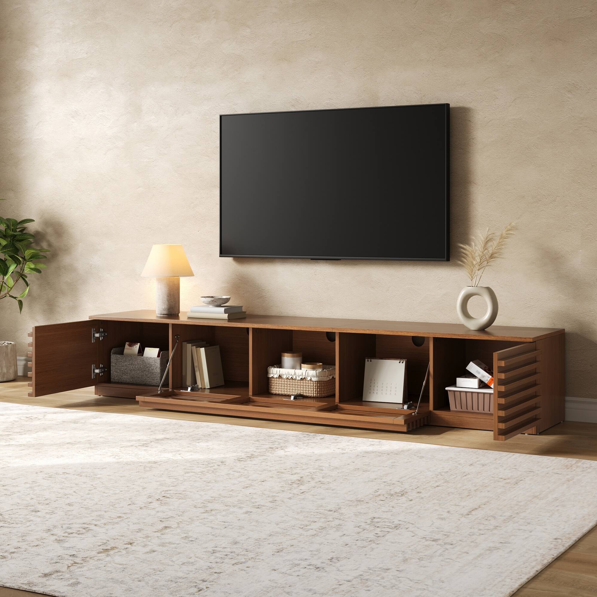 Angle. MERAVOM - Modern TV Stand for TVs up to 90", Entertainment Center with Storage Cabinets, Flip-Down Doors for Living Room - Walnut.