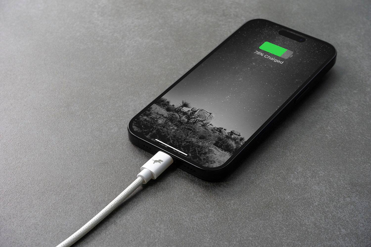 The image shows a smartphone with a battery level of 78%. The phone is plugged into a charger, and the battery indicator displays the percentage of the battery's charge.