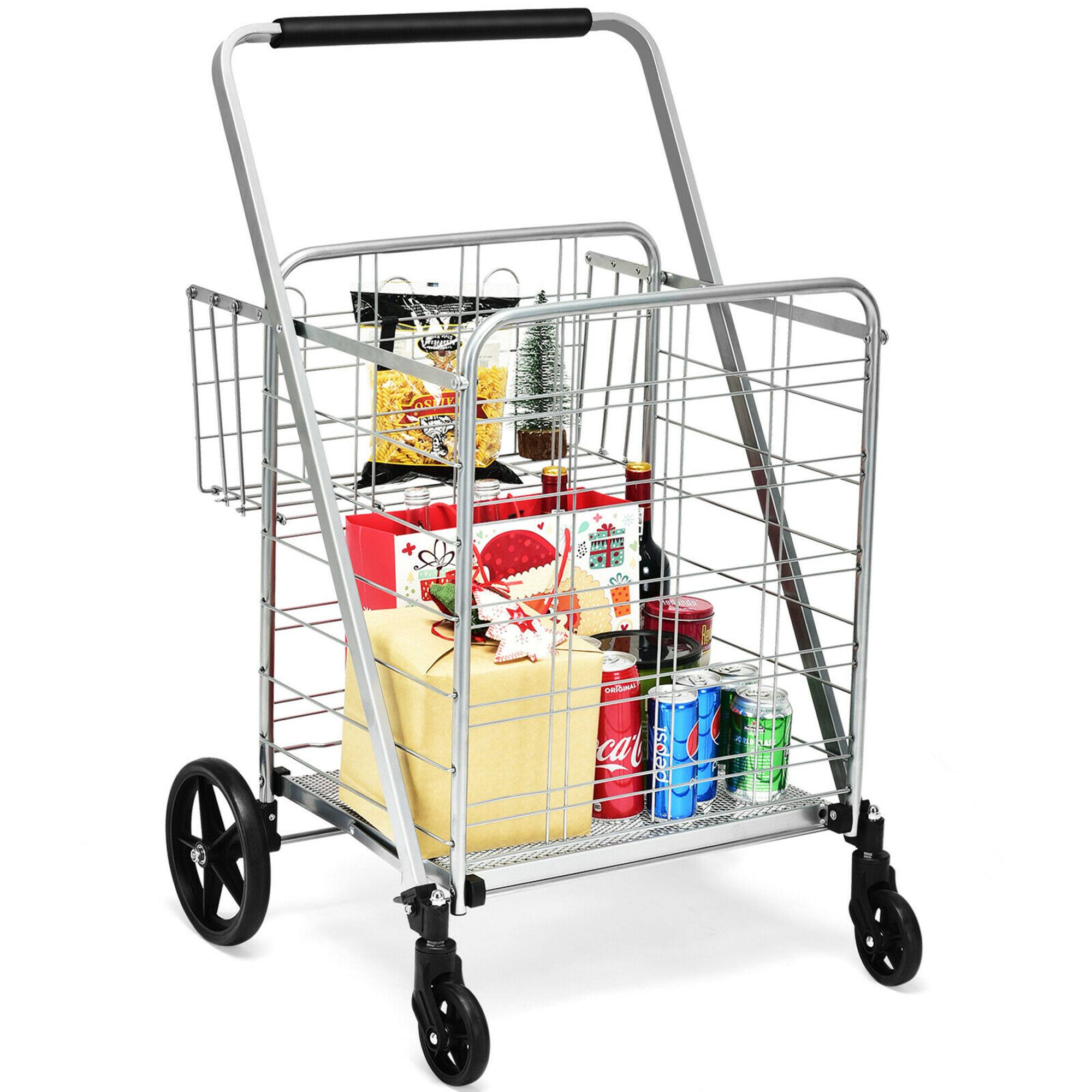 A shopping cart is filled with various items, including a six pack of Coca Cola, a bag of chips, and a bag of cheese. The cart is also holding a bottle of wine and a bottle of soda.