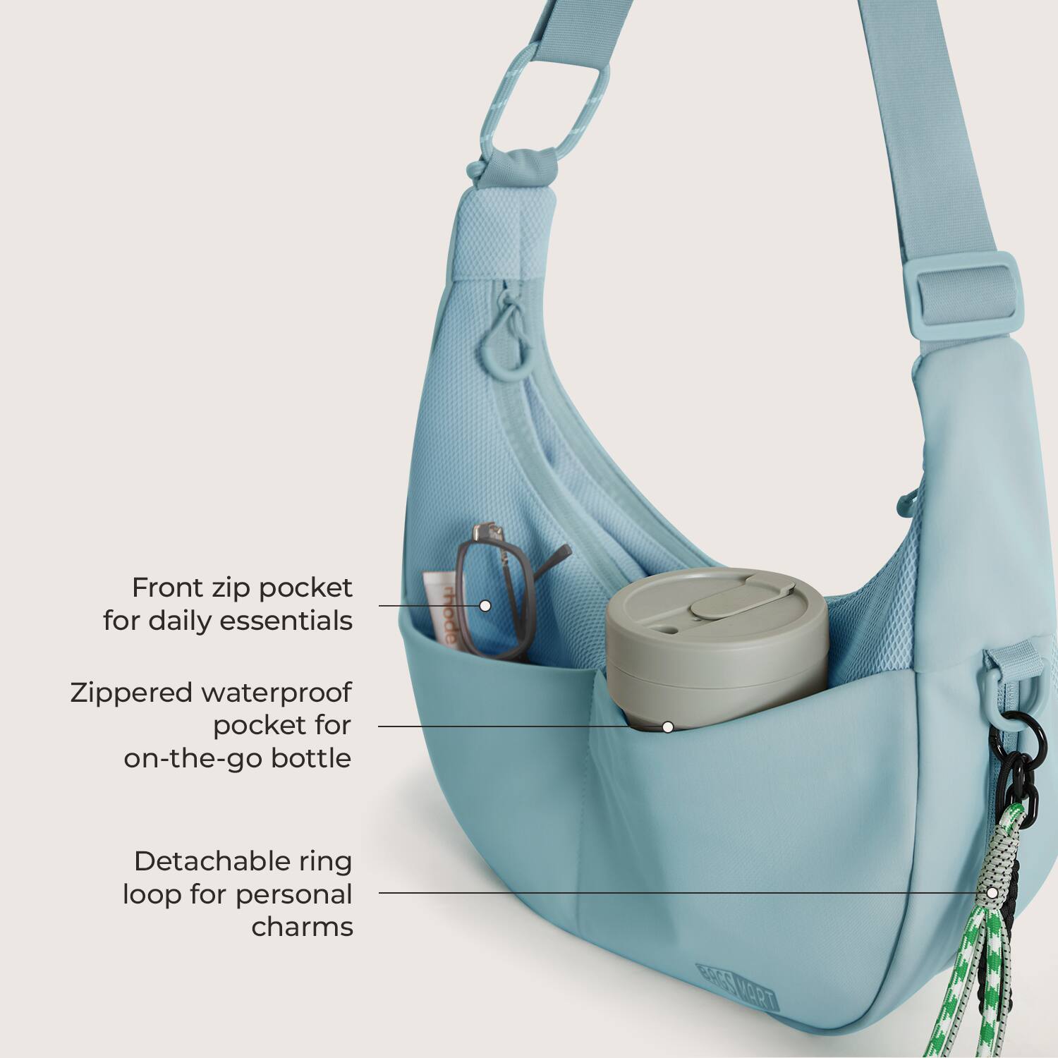 Front zip pocket for daily essentials  
Zippered waterproof pocket for on-the-go bottle  
Detachable ring loop for personal charms  
BAGSV MART