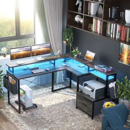 Front. Aheaplus - L-shaped Computer Desk with Drawers, Power Outlets, and LED Lights, Reversible Gaming Desk with Monitor Stand - Gray Oak.