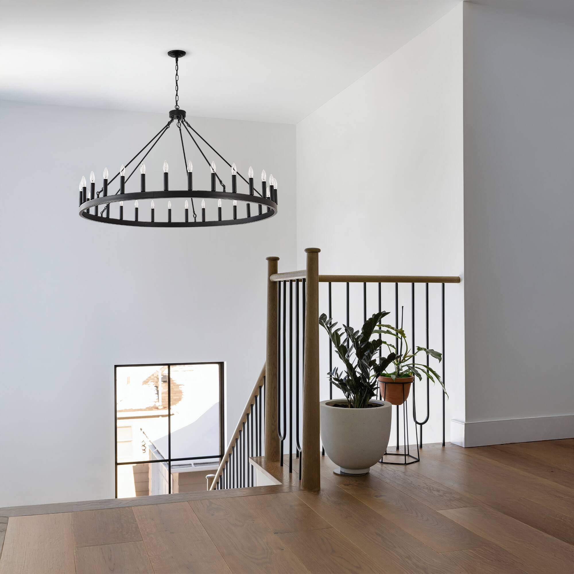 Left. RYHNUYNE - 53 Inch Large Black Farmhouse Wagon Wheel Chandelier 30-Light Industrial Rustic Pendant Light Fixture for High Ceiling - Black.