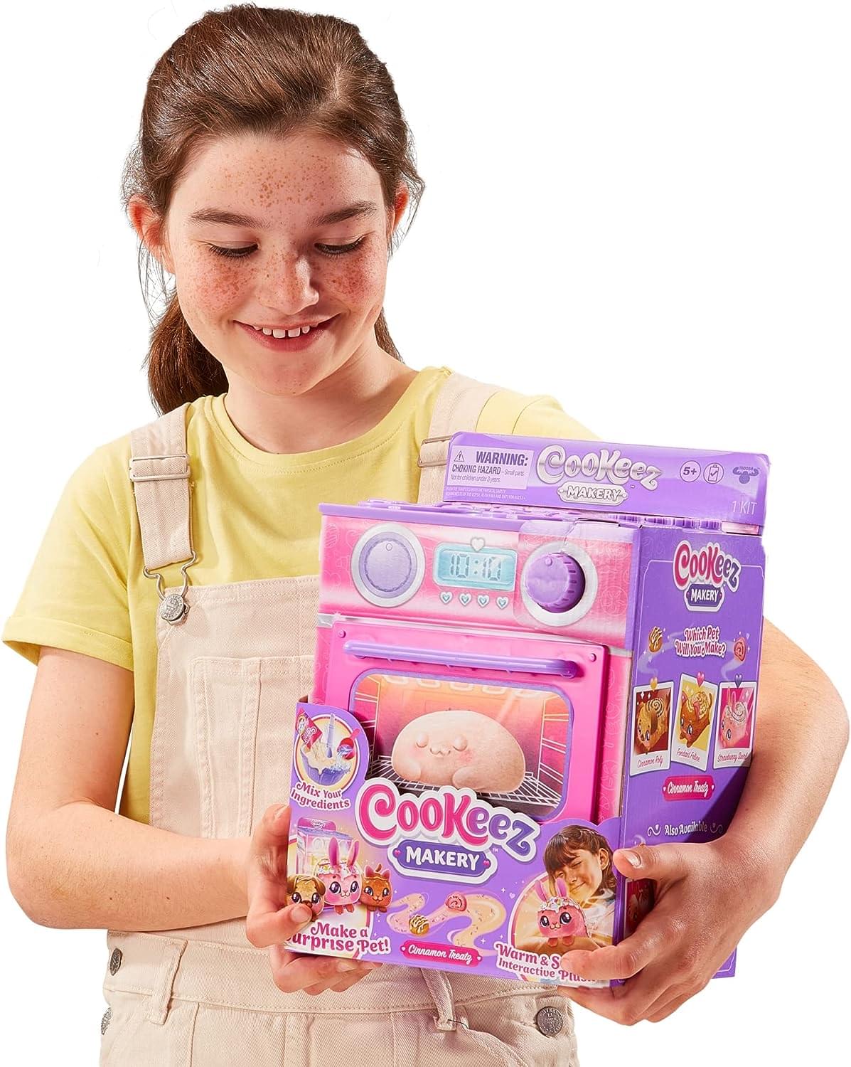 **Cookeez Makery**

**Warning: Choking Hazard - Small Parts. Not for children under 3 years.**

**5+**

**1 Kit**

**Mix Your Ingredients**

**Make a Surprise Pet!**

**Warm & S Interactive Plus**

**Cookeez Makery**

**Switch Pet - Will You Make?**

**Cute & Ready**

**Cute & Ready**

**Cute & Ready**

**Cute & Ready**

**Also Available:**

**Cookeez Makery**