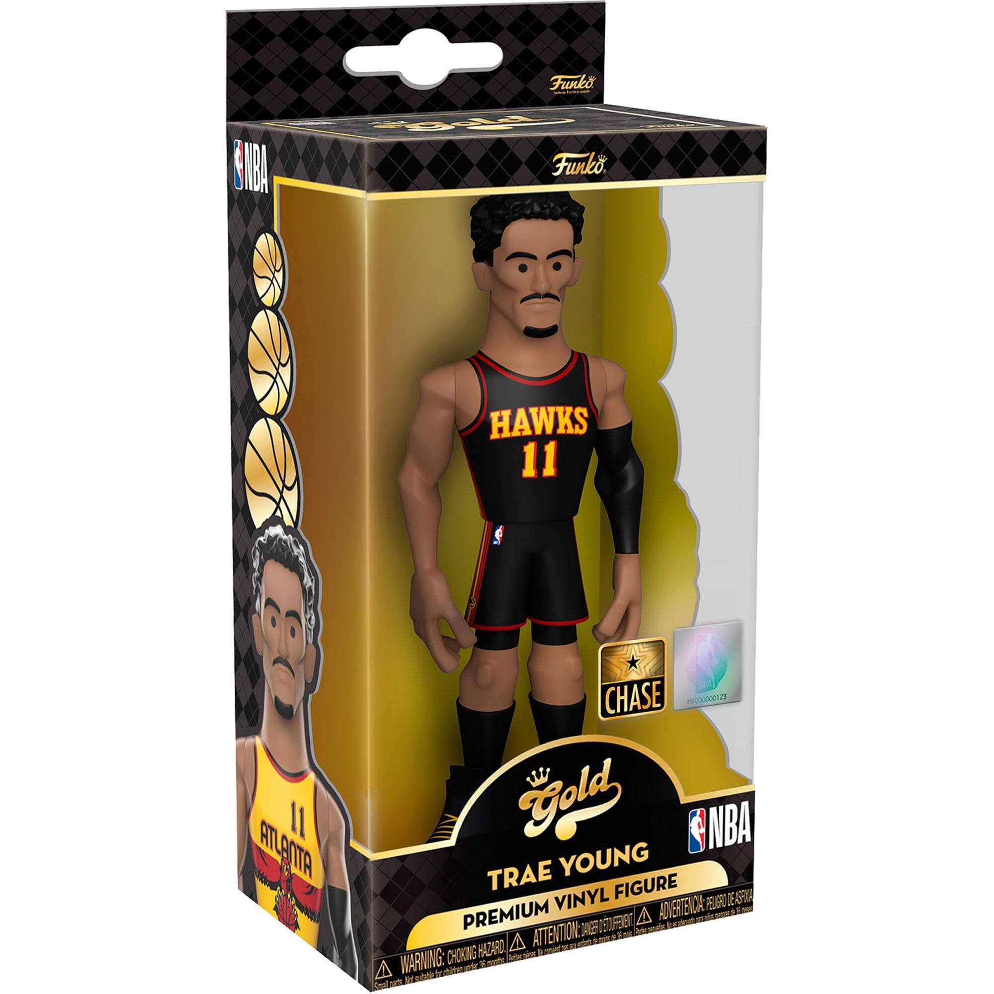 Funko NBA Mot Funko. HAWKS 11 f I1 ATLANTA CHASE ed L Gold NBA TRAE YOUNG VINYL FIGURE DE S ADVERTENCIA % PREMIUM RE 5TUFEE A - A ATTENTION: - de  E T CHOKING HAZARD Advertencia: dite el m - n 2 O