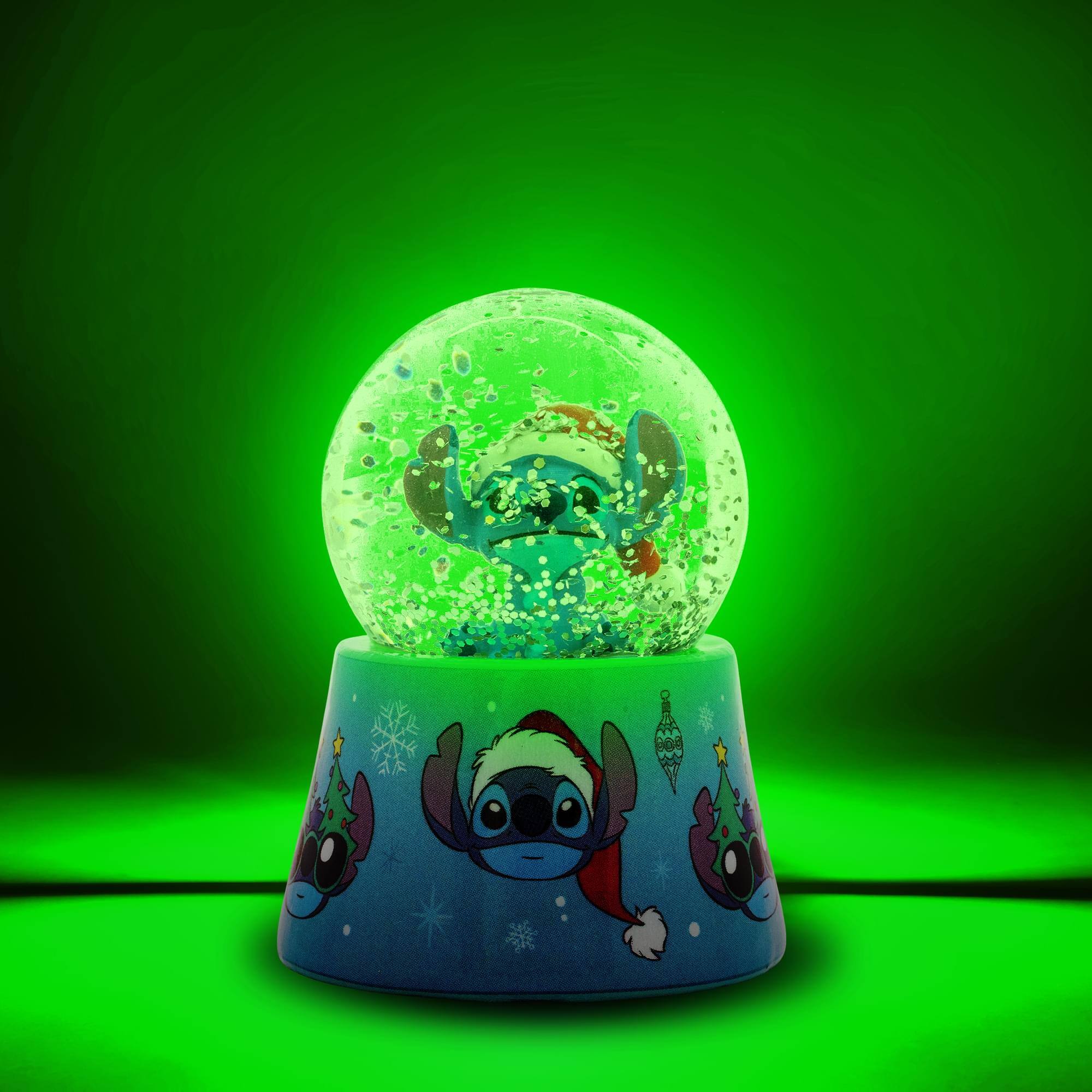 Alt View 1. Silver Buffalo - Disney Lilo & Stitch Santa Stitch 3-Inch Mini Light-Up Snow Globe - Blue.