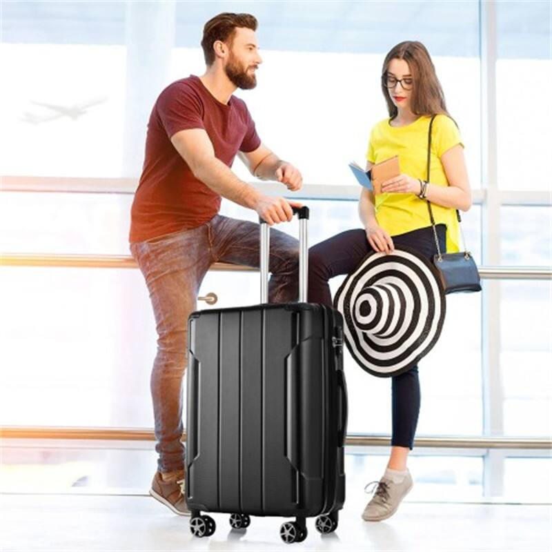 Angle. HTUTWOO - Hardshell Luggage - 24-inch Expandable Checked Suitcase, Lightweight Durable ABS, Double Wheels - Black.