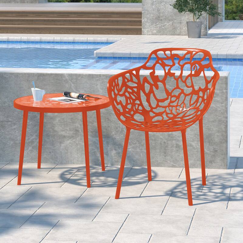 Angle. LeisureMod - Devon Stackable Aluminum Dining Chair with Floral Cutout Design Side Chair for Indoor Outdoor - Orange.