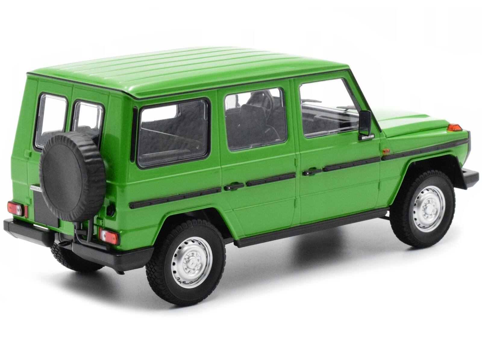 Left. Minichamps - 1980 Mercedes-Benz G-Model (LWB) Green with Black Stripes Limited Edition to 402 pieces Worldwide 1/18 Diecast Model Car - Green with Black.