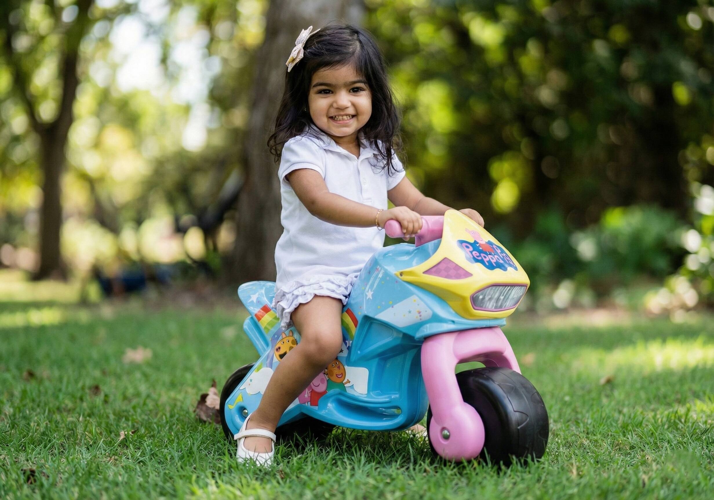 Back. Best Ride On Cars - Peppa Pig foot-to-floor bike - Blue/Pink.