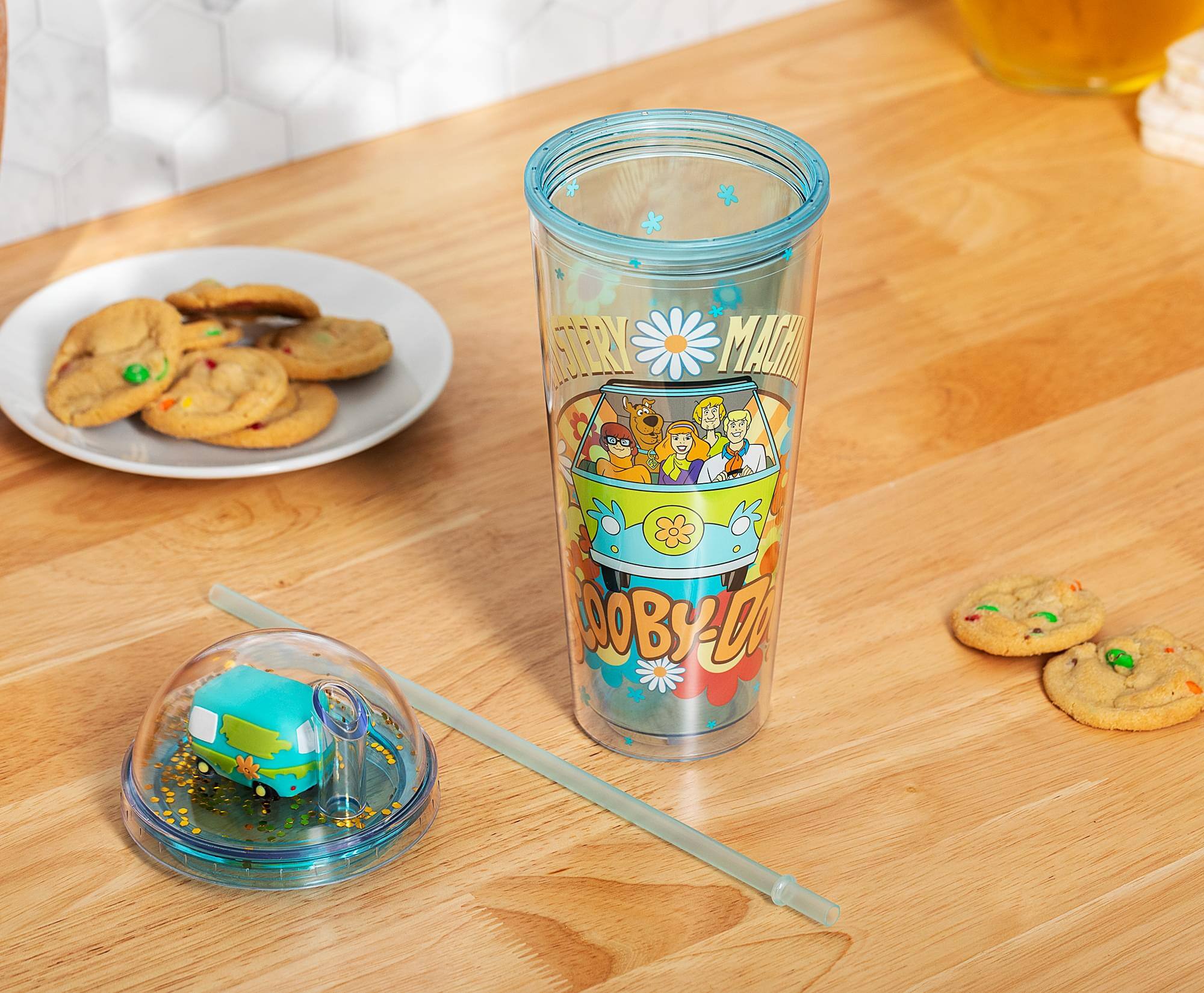 Sure, here is the corrected and grouped text from the image:

**On the Cup:**
- "ESTER MALIA"
- "ROBY-LOU"

**On the Lid:**
- "ROBY-LOU"