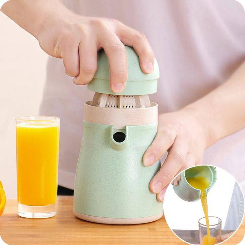 Back. Forest'nSky - Manual Citrus Juicer - 2-in-1 Lemon Orange Press with Strainer & Pour Spout Container in Green - Green.