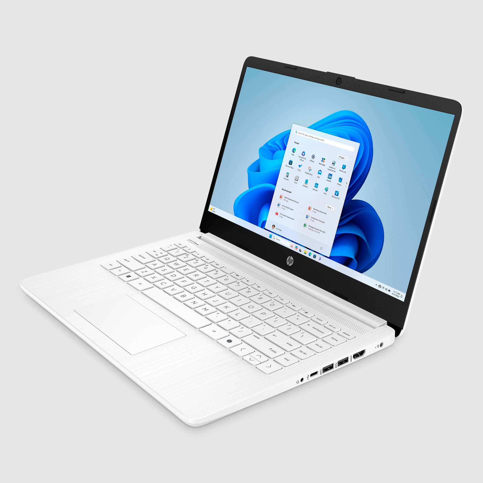 The text on the image is not coherent or organized, so I cannot group or correct it. However, I can provide a brief description of the content:
The image features a white laptop with a blue screen. The screen displays a blue flower and a white background. The laptop's keyboard is visible, with the space bar being the most prominent key.