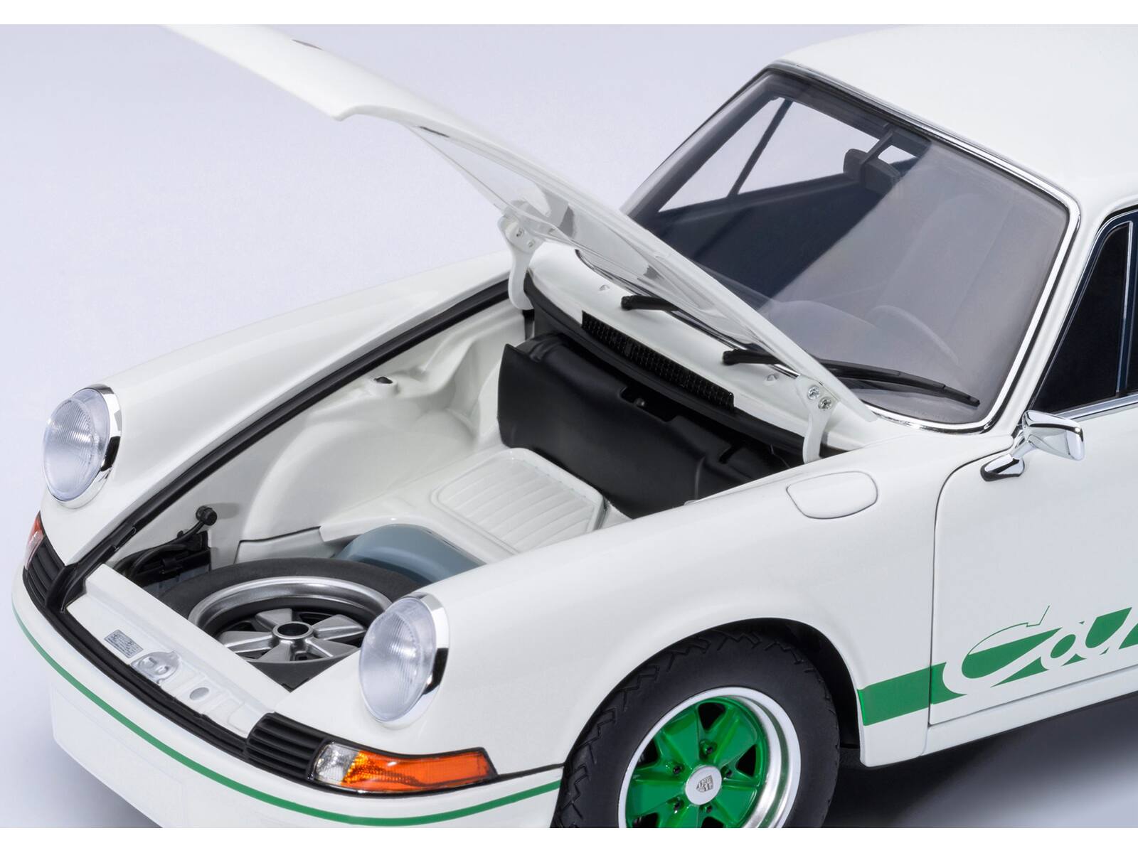 Left. Autoart - Porsche 911 Carrera 2.7 RS Grand Prix White with Green Stripes and Wheels 1/18 Model Car by Autoart - White.