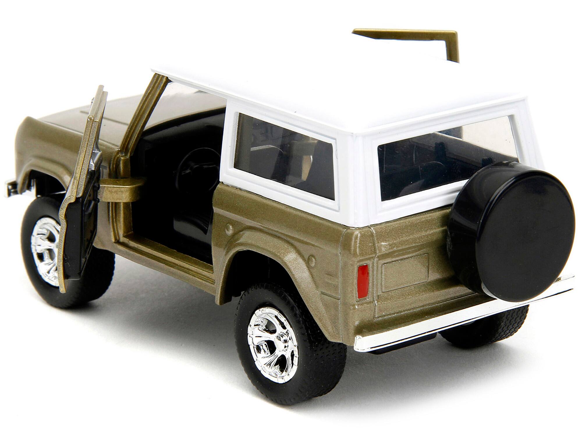 Left. Jada - 1973 Ford Bronco Gold Metallic with White Top and Groot Diecast Figure "Guardians of the Galaxy" "Marvel" Series 1/32 - Gold Metallic With White.