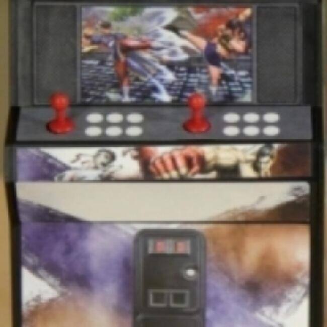 Front. Capcom - Street Fighter x Tekken Coin Bank Special Edition.