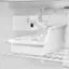 The text on the image reads "RESET CLEAN MAN - ON OFF." This text is likely related to the ice maker or water dispenser in the refrigerator, indicating that it can be reset or cleaned.