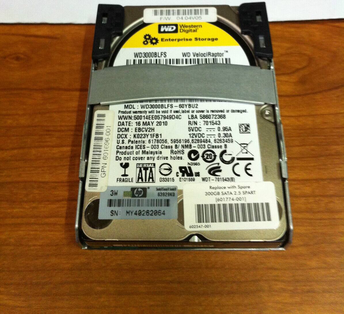 F/W 04 04VO5  
Western Digital Enterprise Storage  
WD VelociRaptor  
MDL: WD3000BLFS  
Product warranty will be void if seal, label or cover is removed or damaged.  
WWN: 50014EE057949D4C  
WWN LBA 586072368  
DATE: 16 MAY 2010  
R/N: 701543  
DCM: EBCV2H  
5VDC: 0.95A  
DCX: K023Y1FB1  
12VDC: 0.30A  
U.S. Patents: 6178056, 5956196, 6289484, 6263459  
Canada ICES 003 Class B/NMB - 003 Classe B  
RoHS  
SERIAL N3565  
GPN: ATA LR US CE  
FRAGILE D33015 E101559  
WDT-7015