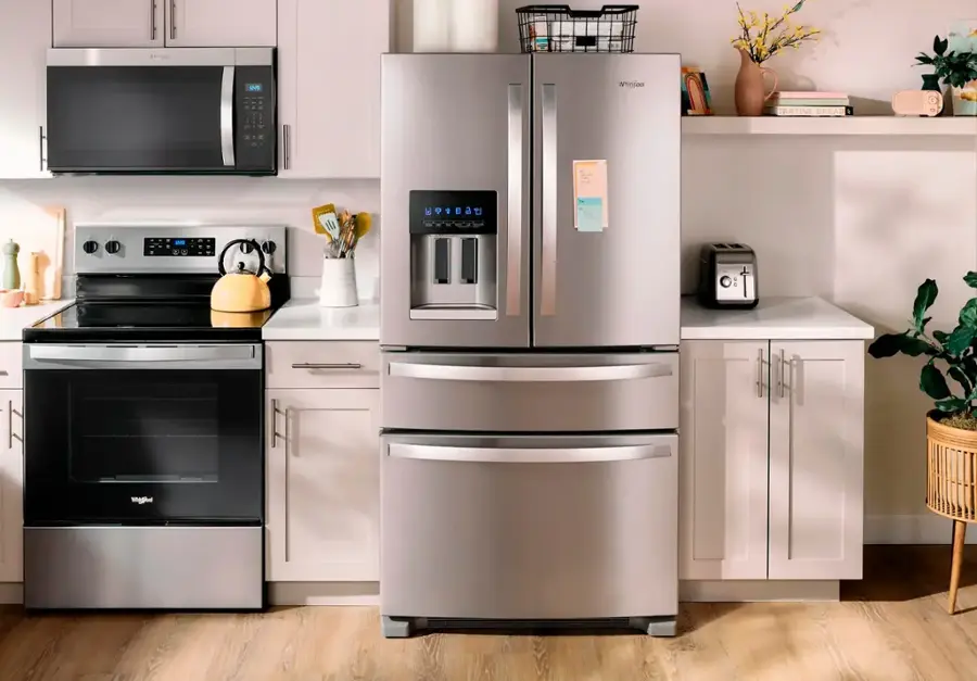 The text on the image reads: "W adc Whirisaol TARTINE BREAD 4 1 e P : I unggibal." This text is not in English and does not provide any context or information about the kitchen appliances.