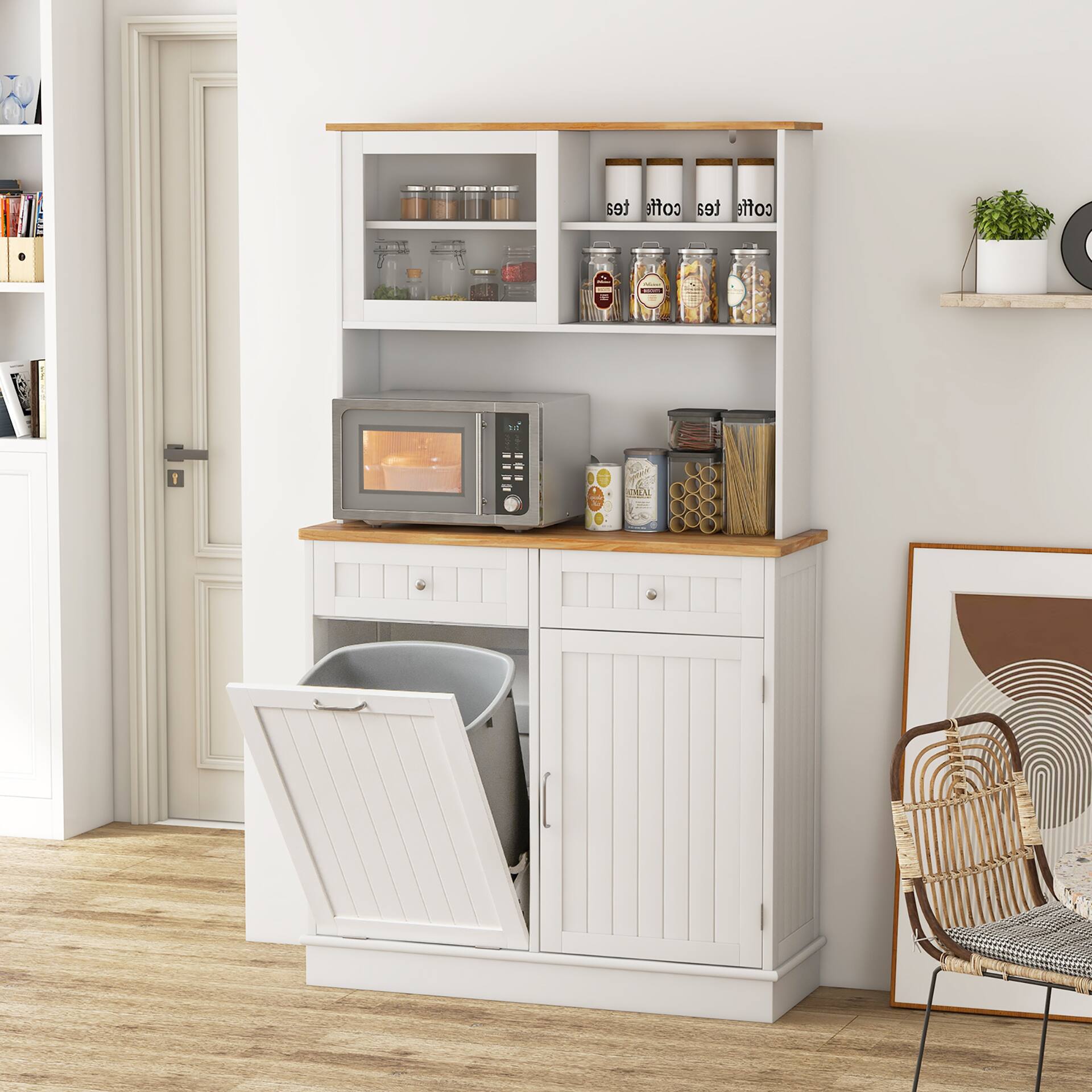 White trash cabinet with trash can in a kitchen setting.