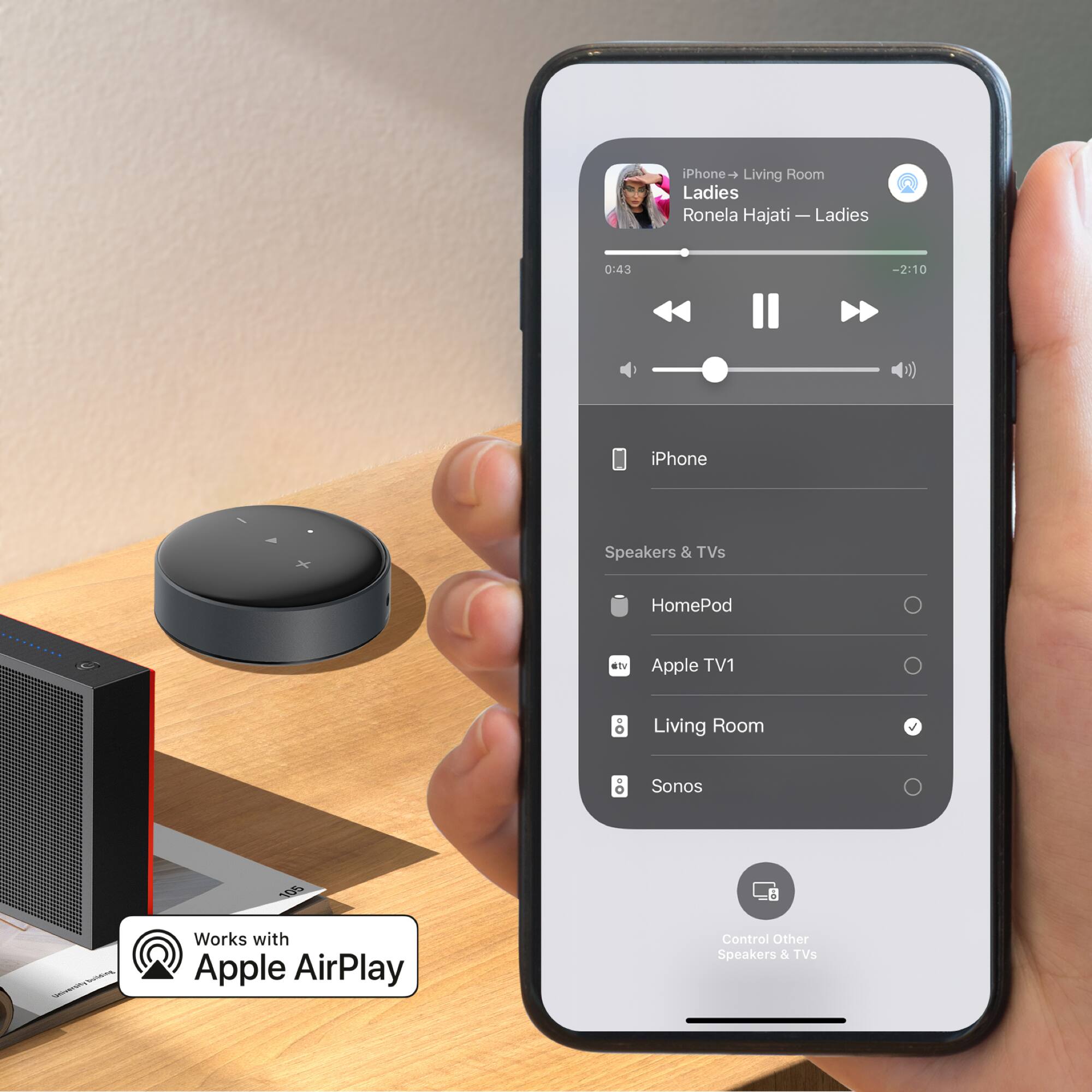 iPhone → Living Room  
Ladies  
Ronela Hajati — Ladies  
0:43 - 2:10  

iPhone Speakers & TVs  
HomePod  
Apple TV1  
Living Room  
Sonos  

Works with Apple AirPlay  
Control Other Speakers & TVs