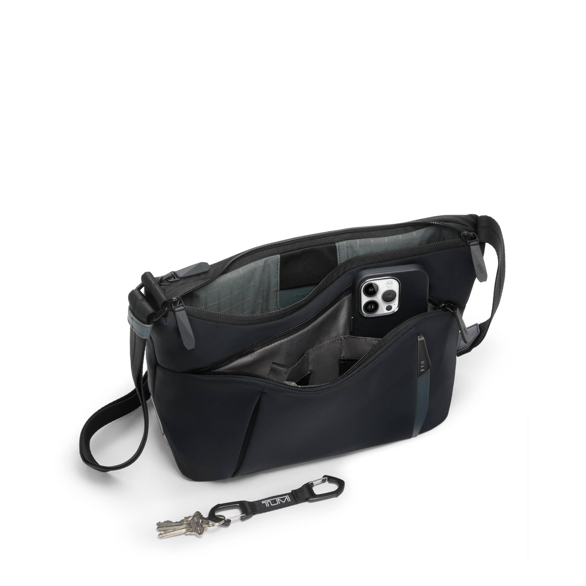 Angle. TUMI - Axis Medium Crossbody - Black.