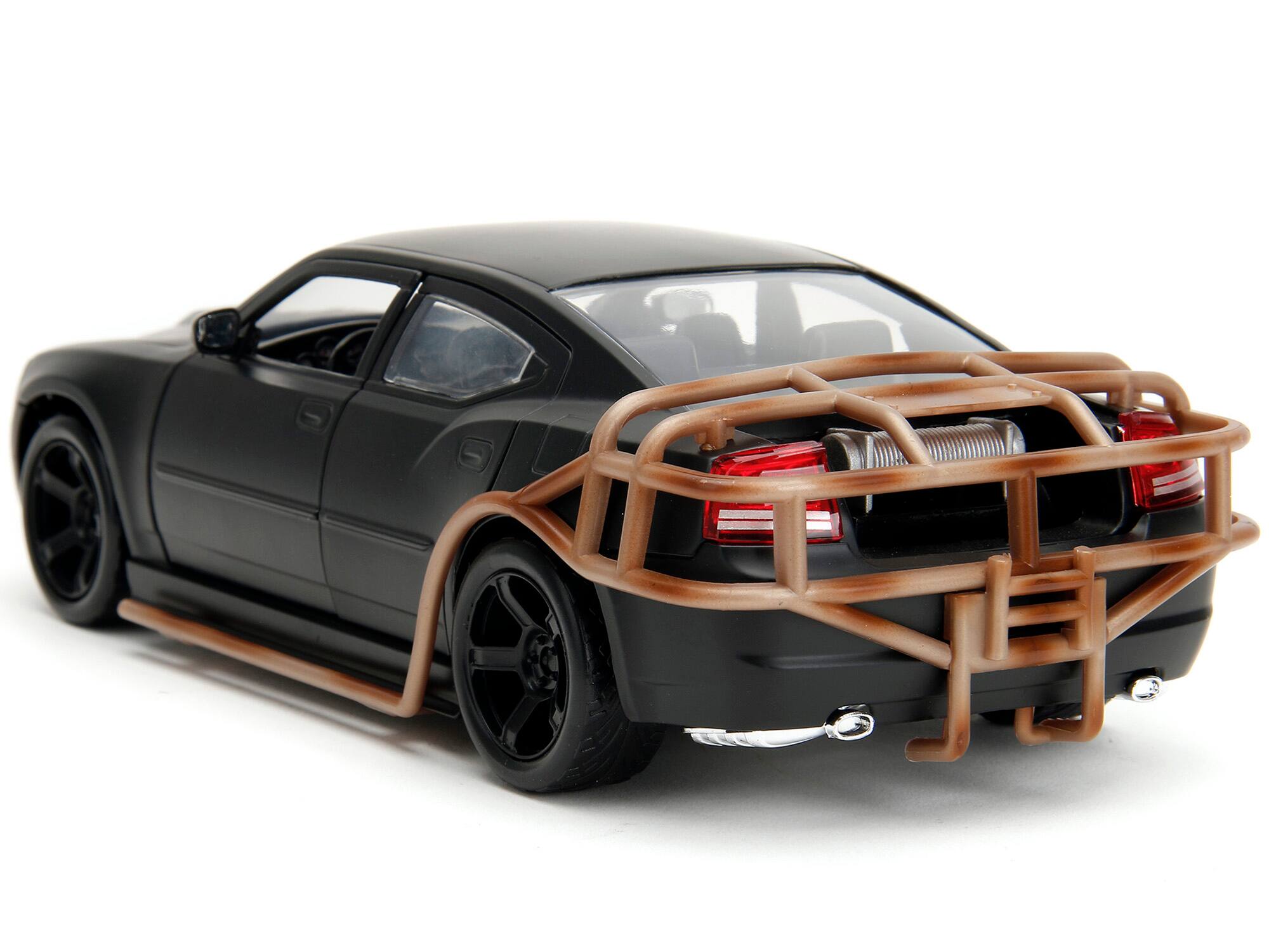 Alt View 1. Jada - 2006 Dodge Charger Matt Black with Outer Cage "Fast & Furious" Movie 1/24 Diecast Model Car by Jada - Matt Black.