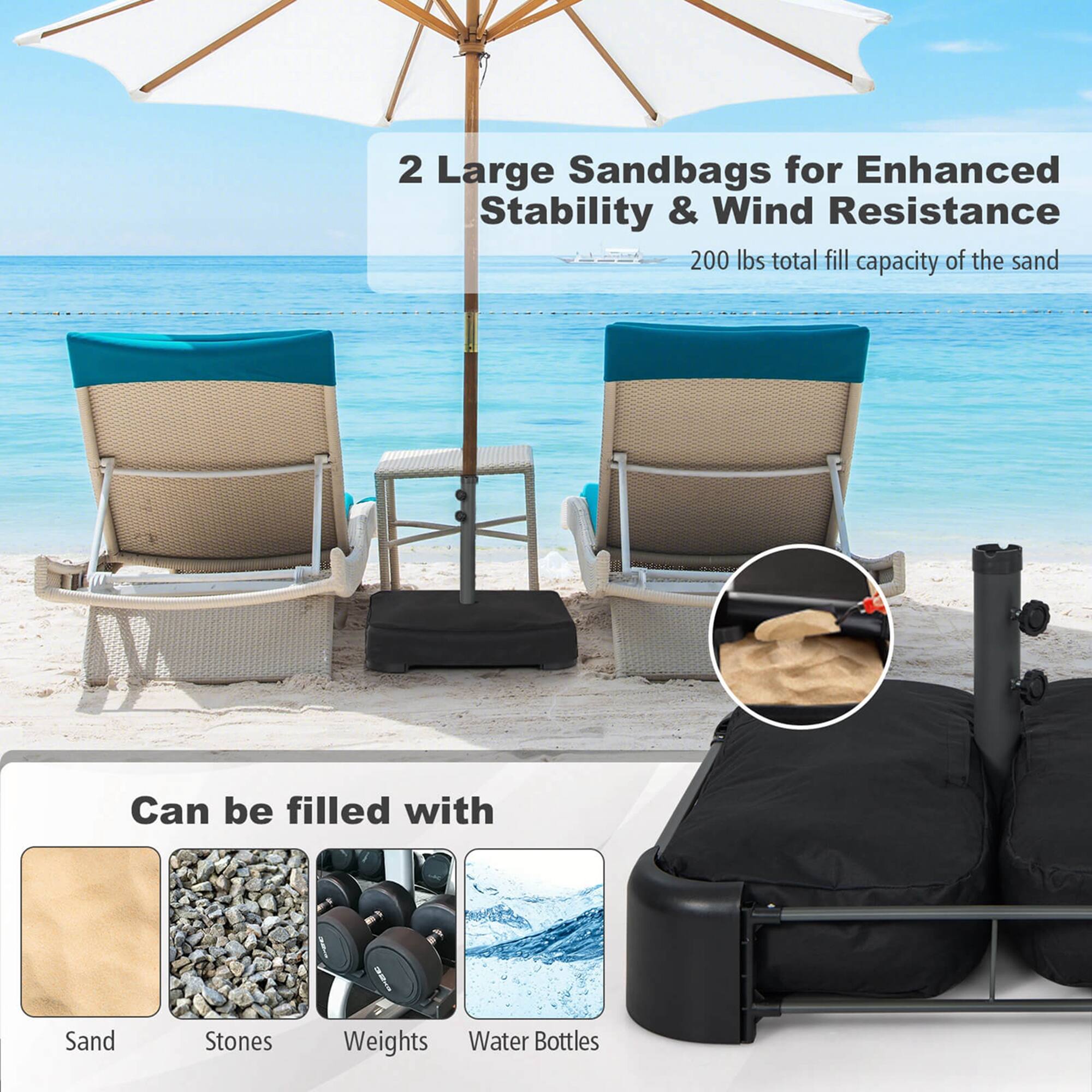 The image features a beach setting with two lawn chairs and an umbrella. The chairs are placed on the sand, and there are two large sandbags nearby, which can be filled with sand, stones, or water bottles for enhanced stability and wind resistance. The umbrella provides shade and protection from the sun, making it a perfect spot for relaxation.
