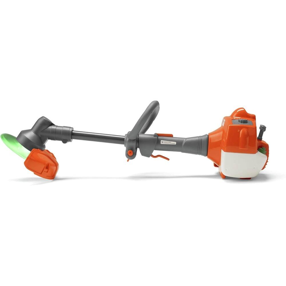 Angle. Husqvarna - Toy Trimmer and Toy Weed Eater with Realistic Sounds and Light-Up Trimmer Line for Kids Ages 3 and Up.