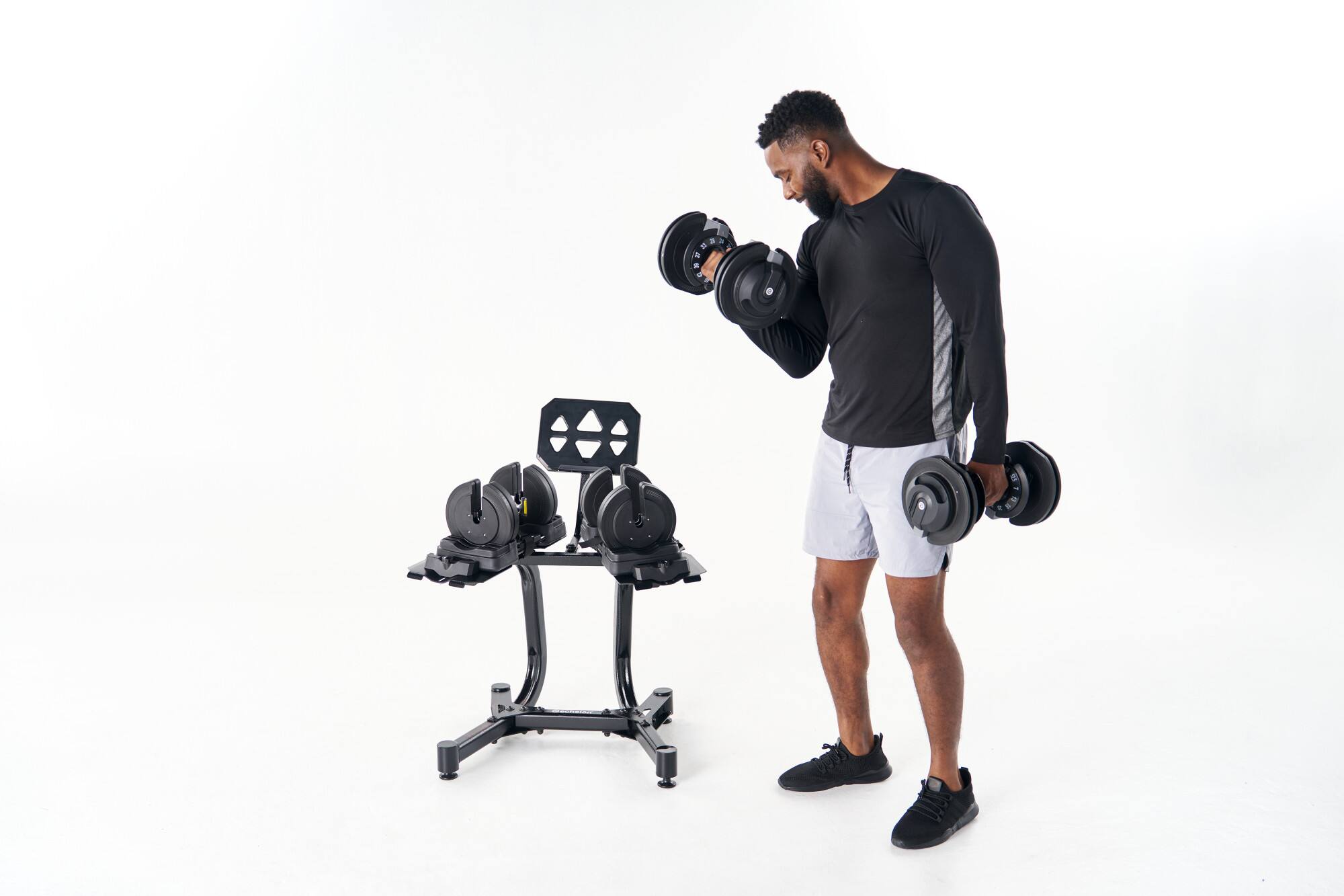 Alt View 1. Echelon - Adjustable Dumbbells Set 7–52.5 lbs with Stand, Quick Weight Adjustment, Space-Saving Design - Black.