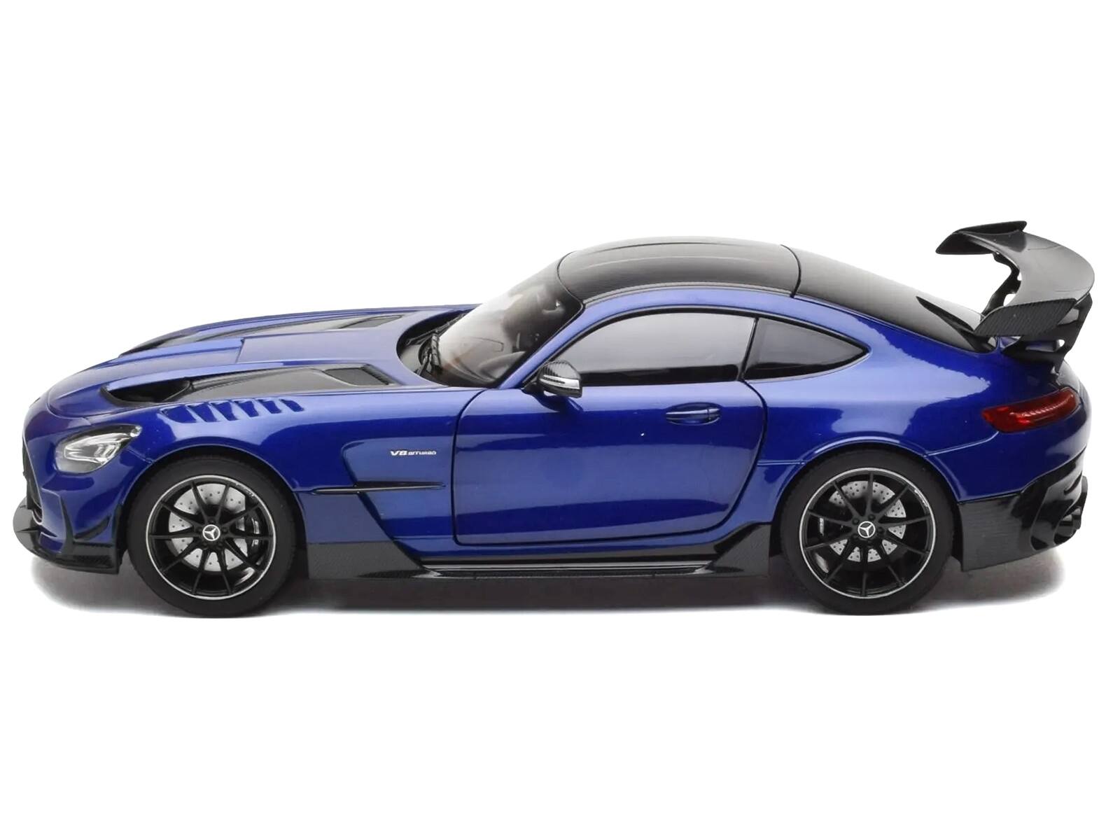 Left. Norev - 2021 Mercedes-Benz AMG GT Black Series Blue Metallic with Carbon Top and Hood Stripes 1/18 Diecast Model Car by Norev - Blue Metallic.
