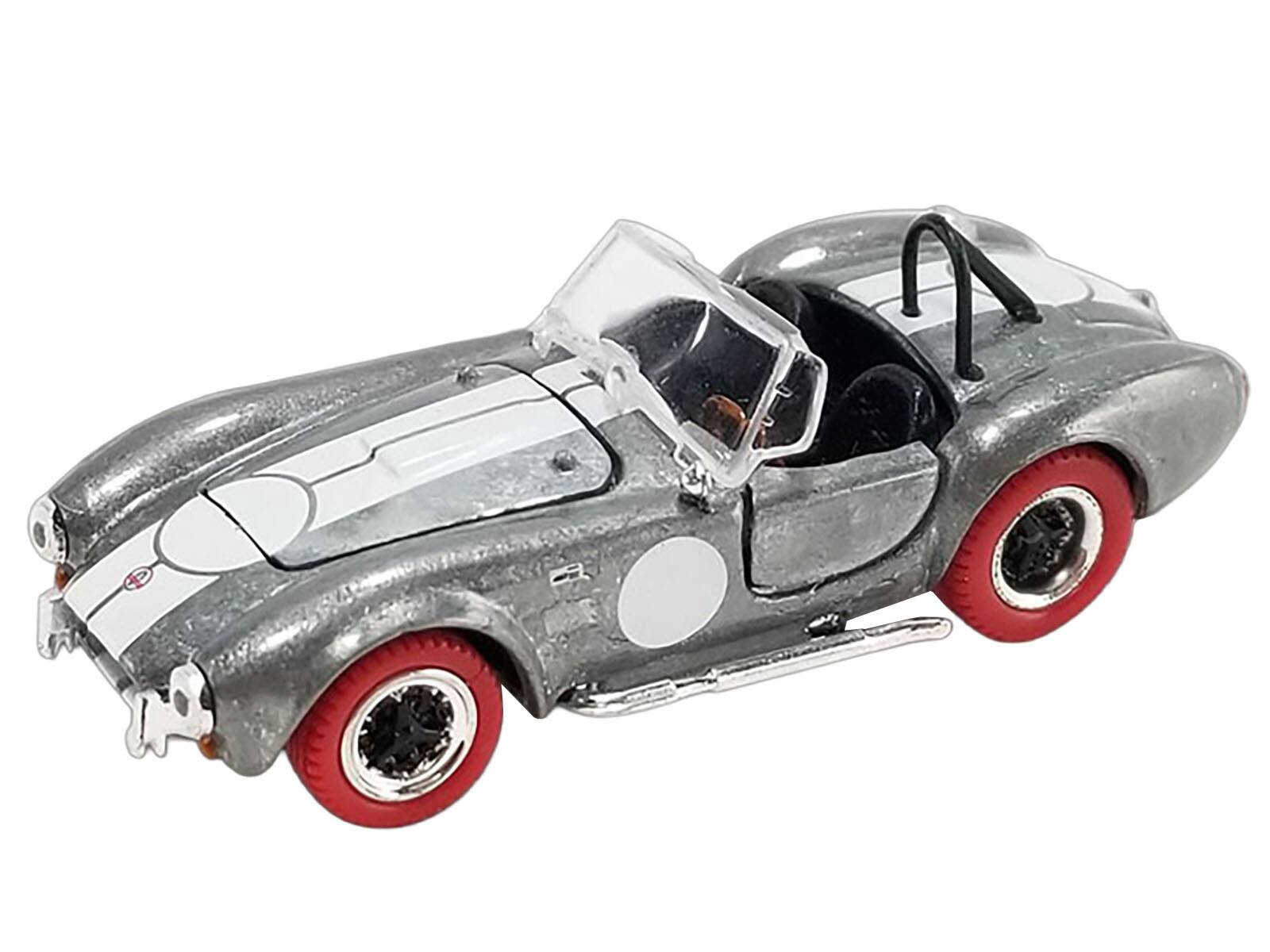 Angle. ACME - Shelby Cobra 427 S/C Raw Metal with White Stripes and Red Tires "Shelby Collectibles" Series 1/64 - Multi.