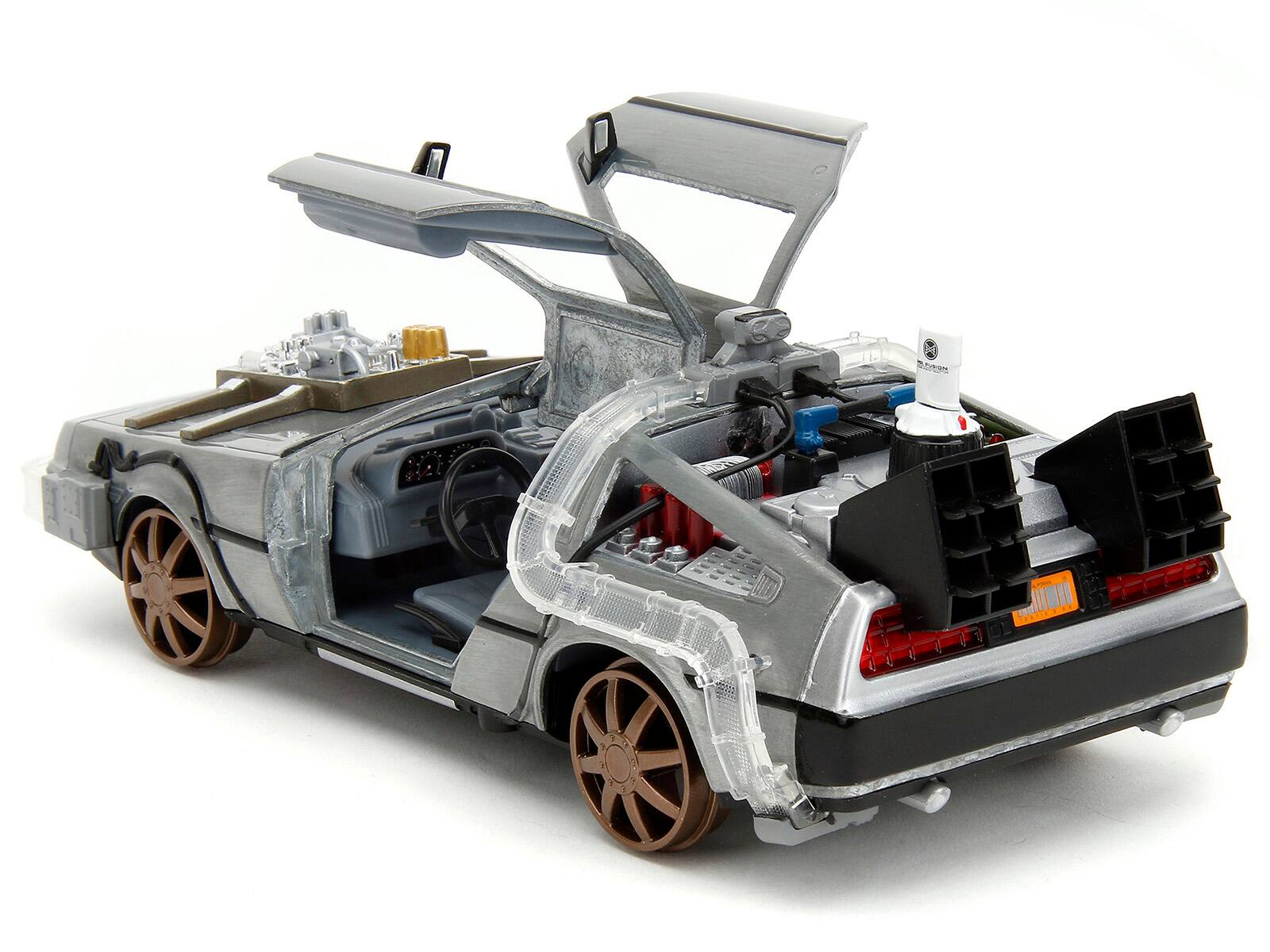 Alt View 1. Jada - DeLorean Brushed Metal Time Machine Train Wheel Version with Lights Back to the Future Part III Movie 1/24 Rides - Grey.