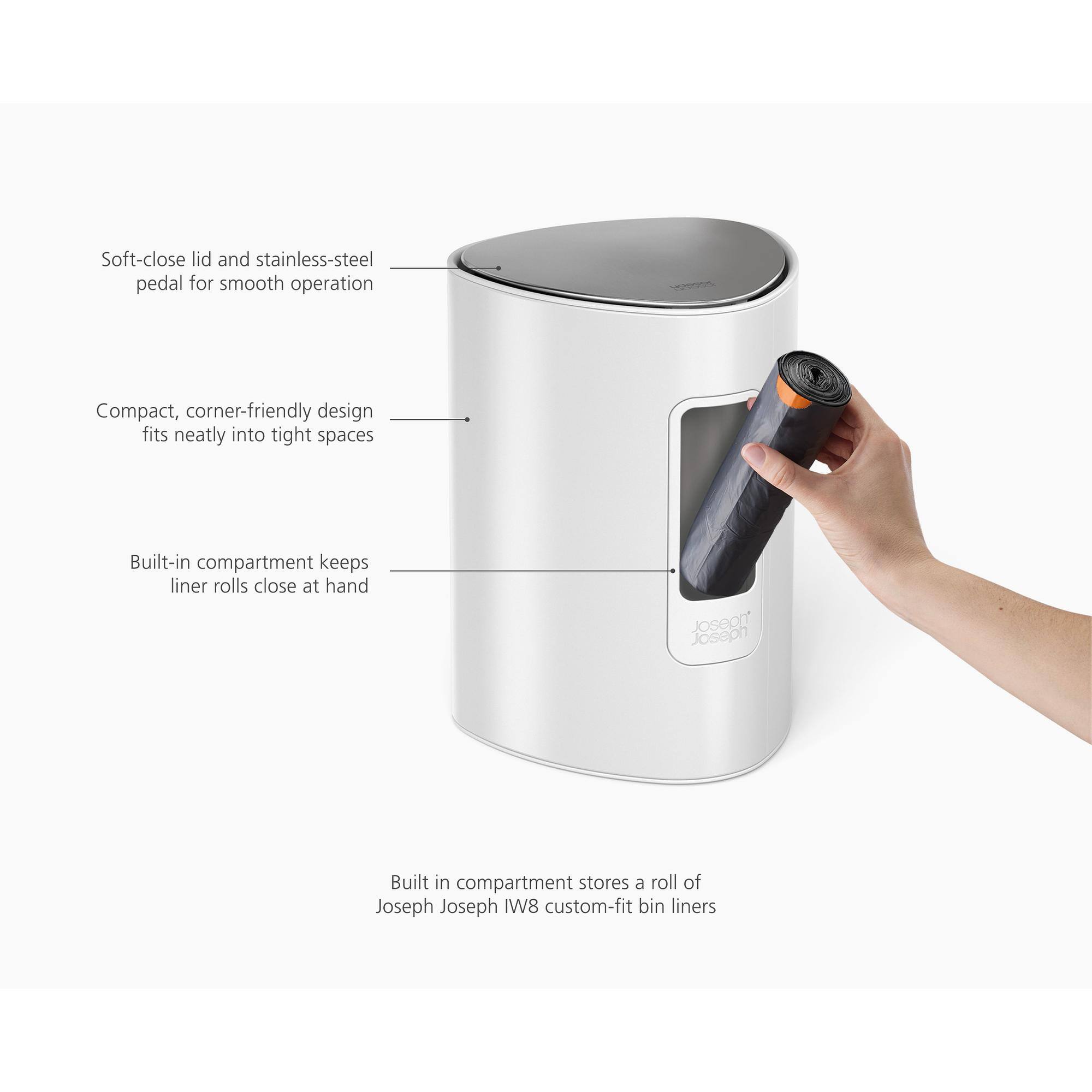 Soft-close lid and stainless-steel pedal for smooth operation  
Compact, corner-friendly design fits neatly into tight spaces  
Built-in compartment keeps liner rolls close at hand  
Built-in compartment stores a roll of Joseph Joseph IW8 custom-fit bin liners