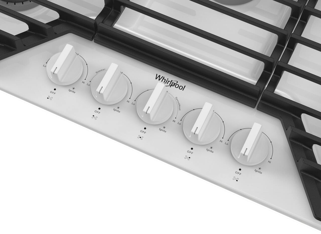 The image shows a close-up view of a Whirlpool stove with a row of knobs. The knobs are labeled with the following text: "Whirlpool 1 SpeedHeat Hi Lo." The knobs are positioned horizontally, and there are four of them in total. The stove appears to be a modern and efficient appliance for cooking.