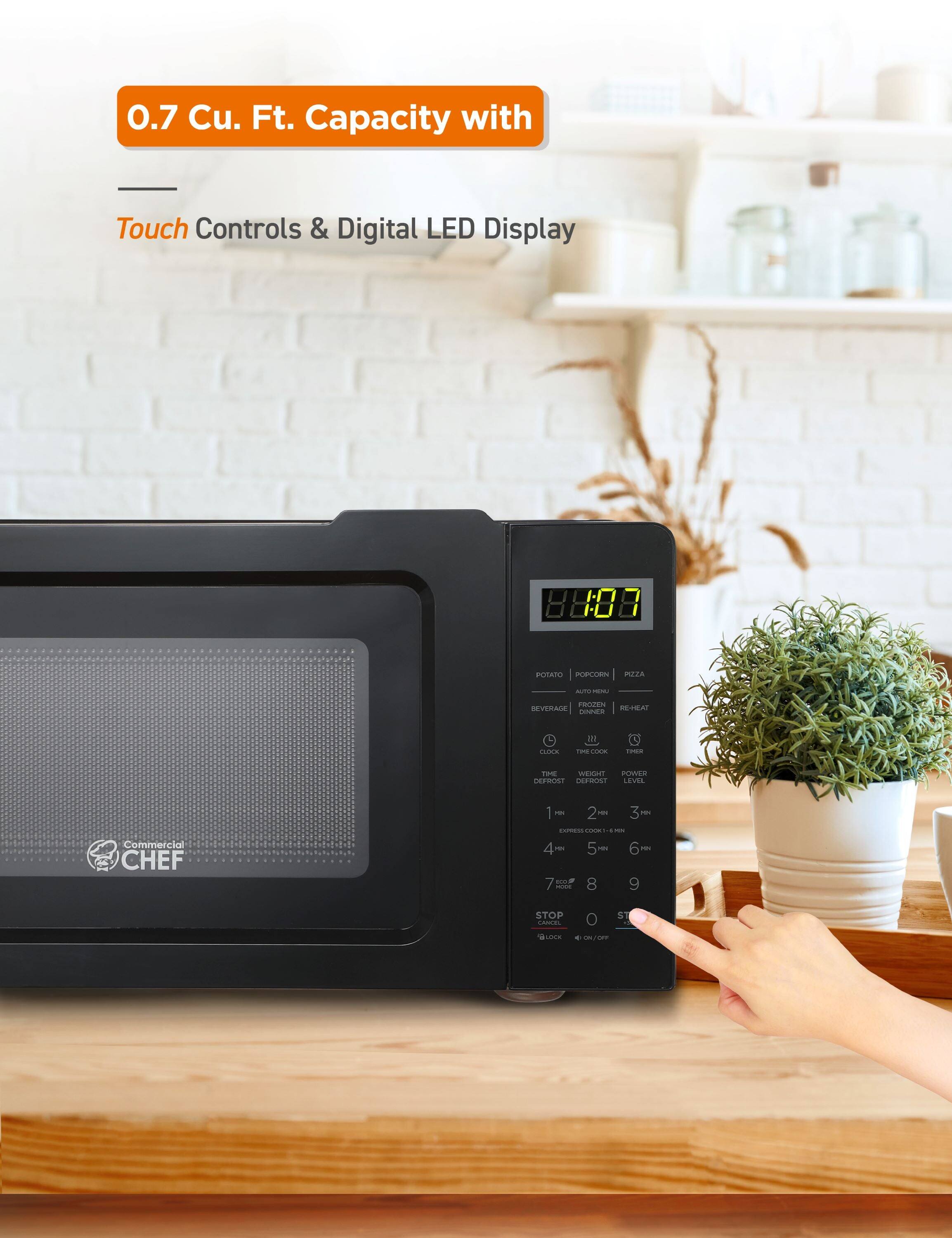 0.7 Cu. Ft. Capacity with Touch Controls & Digital LED Display

POTATO POPCORN PIZZA AUTO MENU BEVERAGE FROZEN DINNER
CLOCK TIME COOK TIME DEFROST WEIGHT POWER LEVEL
1 HR 2 HR 3 HR 4 HR 5 HR 6 HR
REHEAT EXPRESS COOK 1 MIN 2 MIN 3 MIN 4 MIN 5 MIN 6 MIN
7 HR 8 HR 9 HR STOP CANCEL LOCK ON/OFF