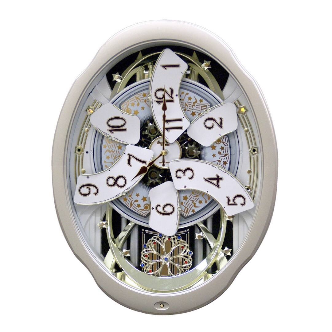 Angle. Hivvago - Moving Face Pendulum Wall Clock - Plays Melodies Every Hour - White.