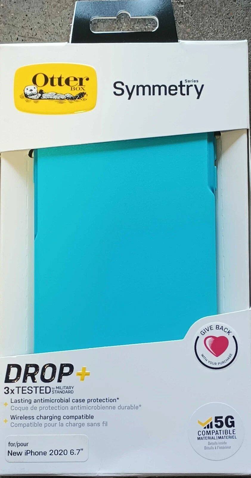 Sure, here is the corrected and grouped text from the image:

---

**Otter Box**

**Symmetry Series**

**DROP+**

- 3x TESTED MILITARY
- Lasting antimicrobial case protection*
- Coque de protection antimicrobienne durable*
- Wireless charging compatible
- Compatible pour la charge sans fil

**for/pour New iPhone 2020 6.7"**

**5G COMPATIBLE MATERIAL**

**GIVE BACK**

*Details inside

---

*Note: The asterisk (*) likely refers to additional details or terms and conditions mentioned inside the packaging.