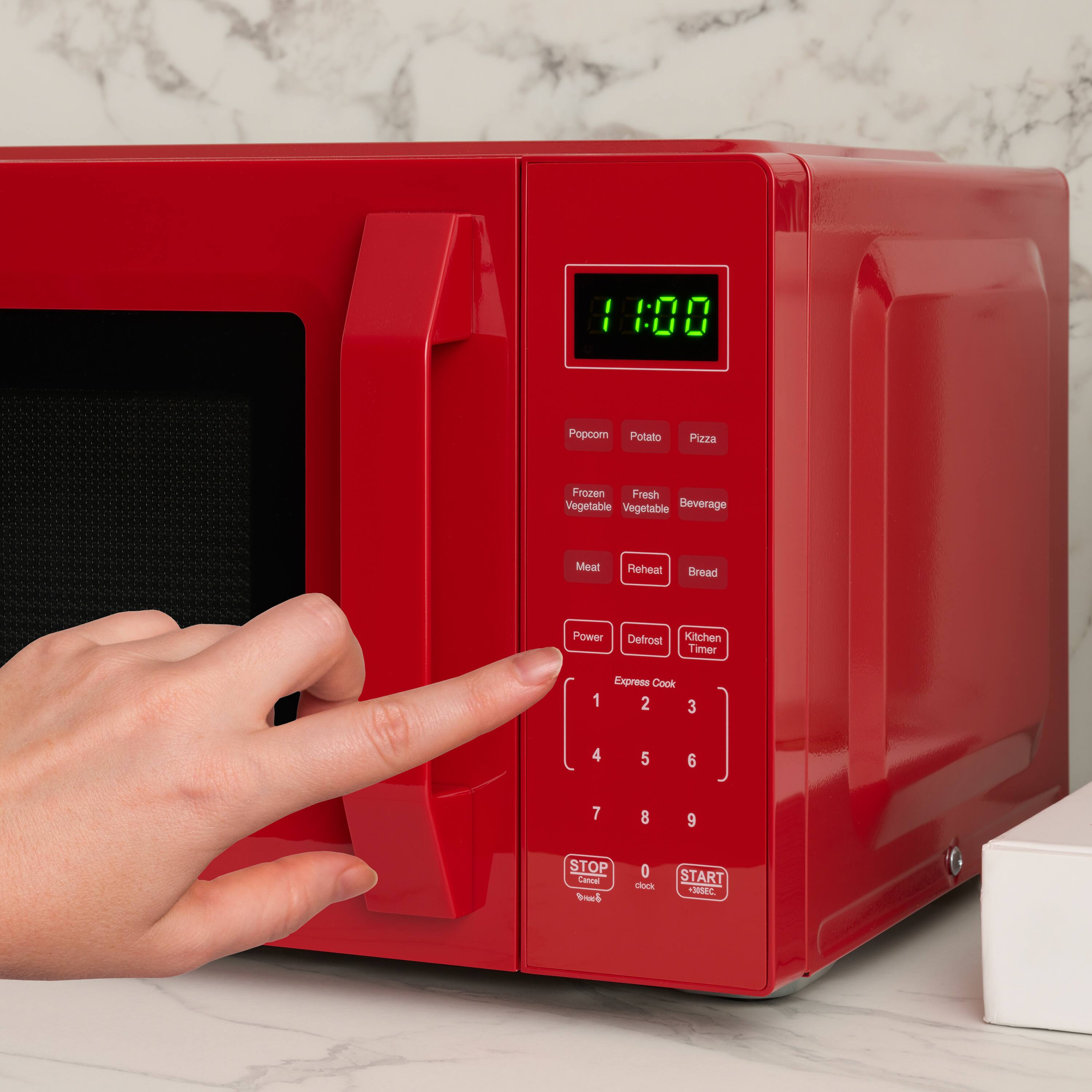 11:00  
Popcorn Potato Pizza Frozen Fresh Vegetable Beverage Meat Reheat Bread Power Defrost Kitchen Timer  
Express Cook 1 2 3 4 5 6 7 8 9 STOP Cancel 0 Start