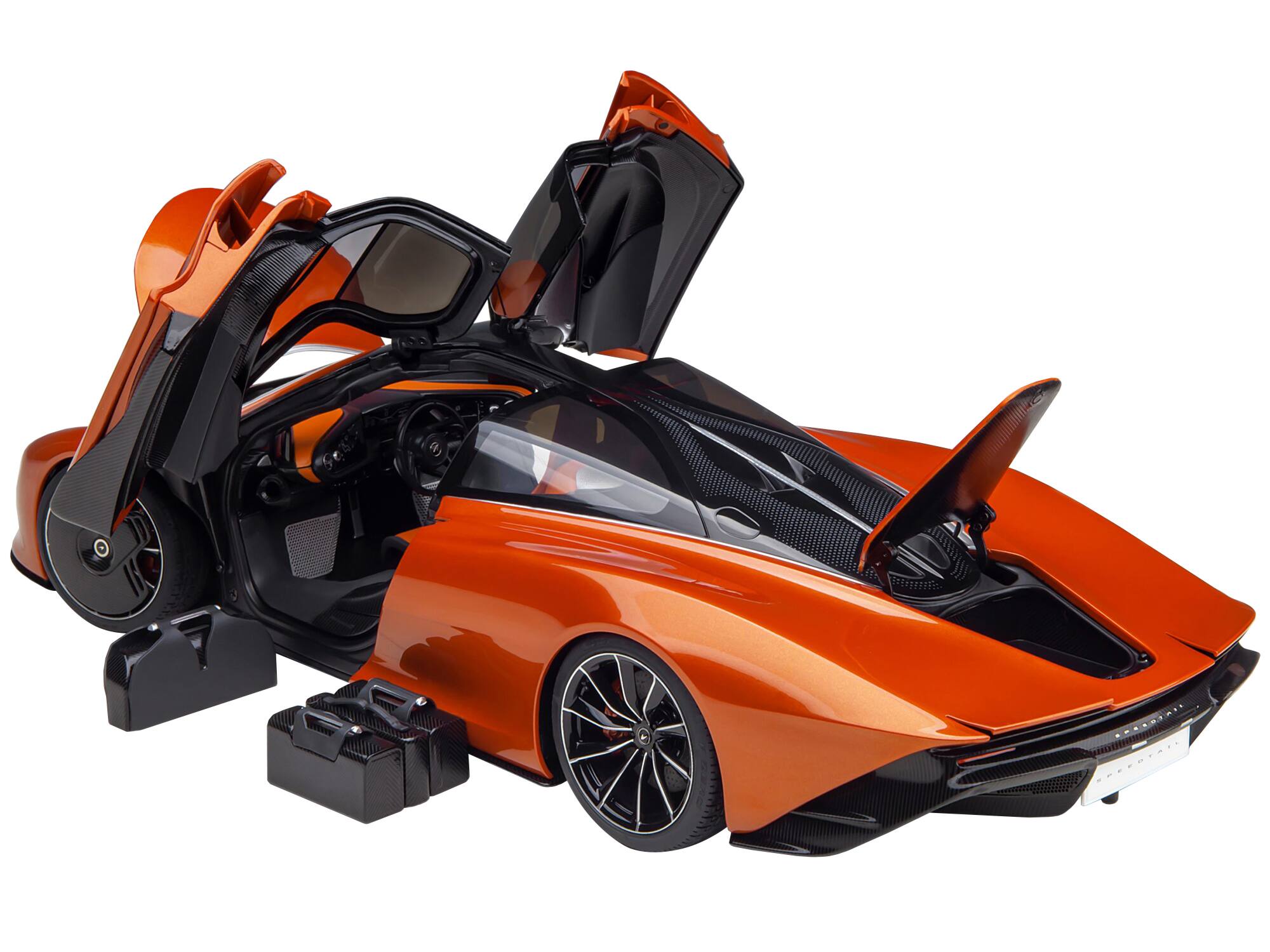 Angle. Autoart - McLaren Speedtail Volcano Orange Metallic with Black Top and Suitcase Accessories 1/18 Model Car by Autoart - Volcano Orange Metallic With Black.