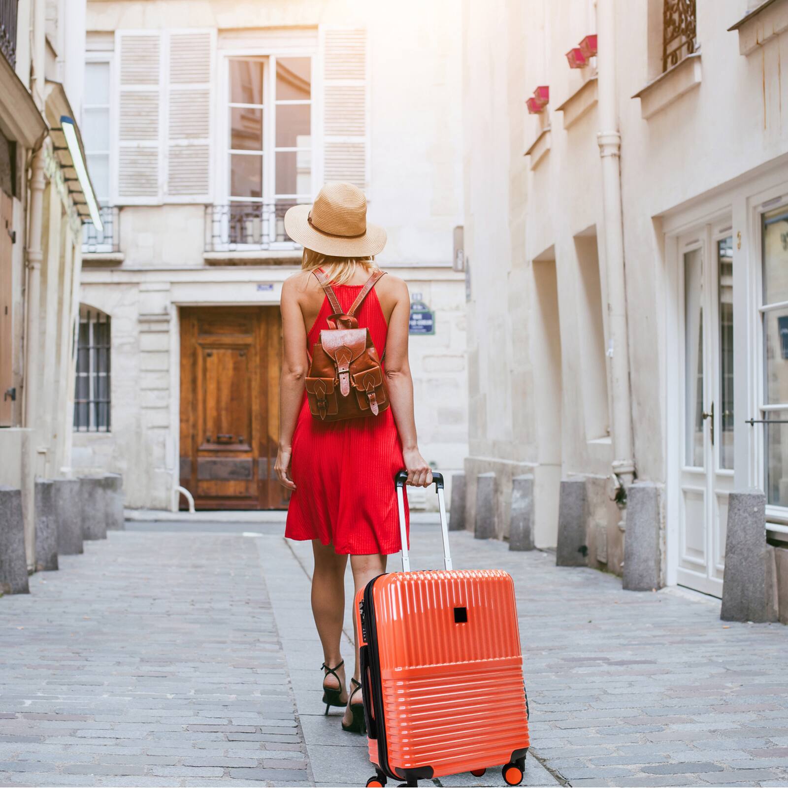 Angle. World Traveler - Tonal 2-Piece Lightweight Polycarbonate Hardside Expandable Spinner Luggage Set with TSA Lock (20" & 28") - Coral.
