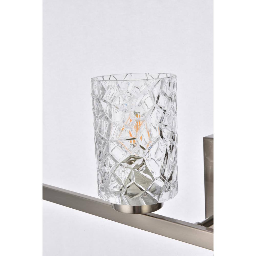 Left. Living District - Cassie 4 lights bath sconce in satin nickel with clear shade - Satin Nickel And Clear Shade.