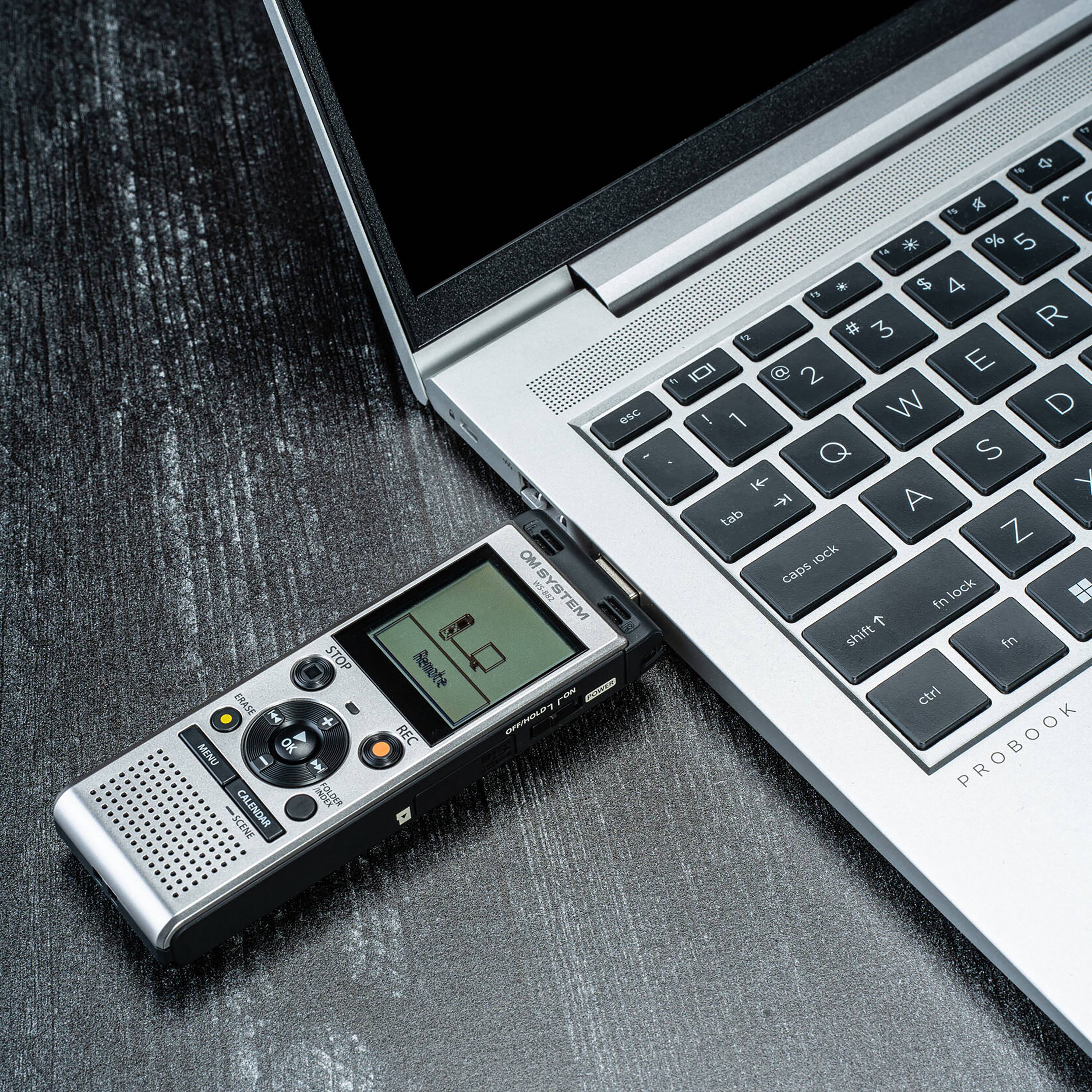 The text on the image reads:

"STOP ERASE + MENU OK I AN POLDER SCENE CALENDAR Remote REC MSC OM SYSTEM EM Fn C DRHOLD 1y Y 1g * % 5 * $ 4 15 # 3 R 1OI 8 2 E 2 ! W D 1 Q S A T tab Z OCk caps lock B tn T shift in ctrl PROBOOK"

The text appears to be a combination of various computer keys and functions, possibly related to the laptop's keyboard.